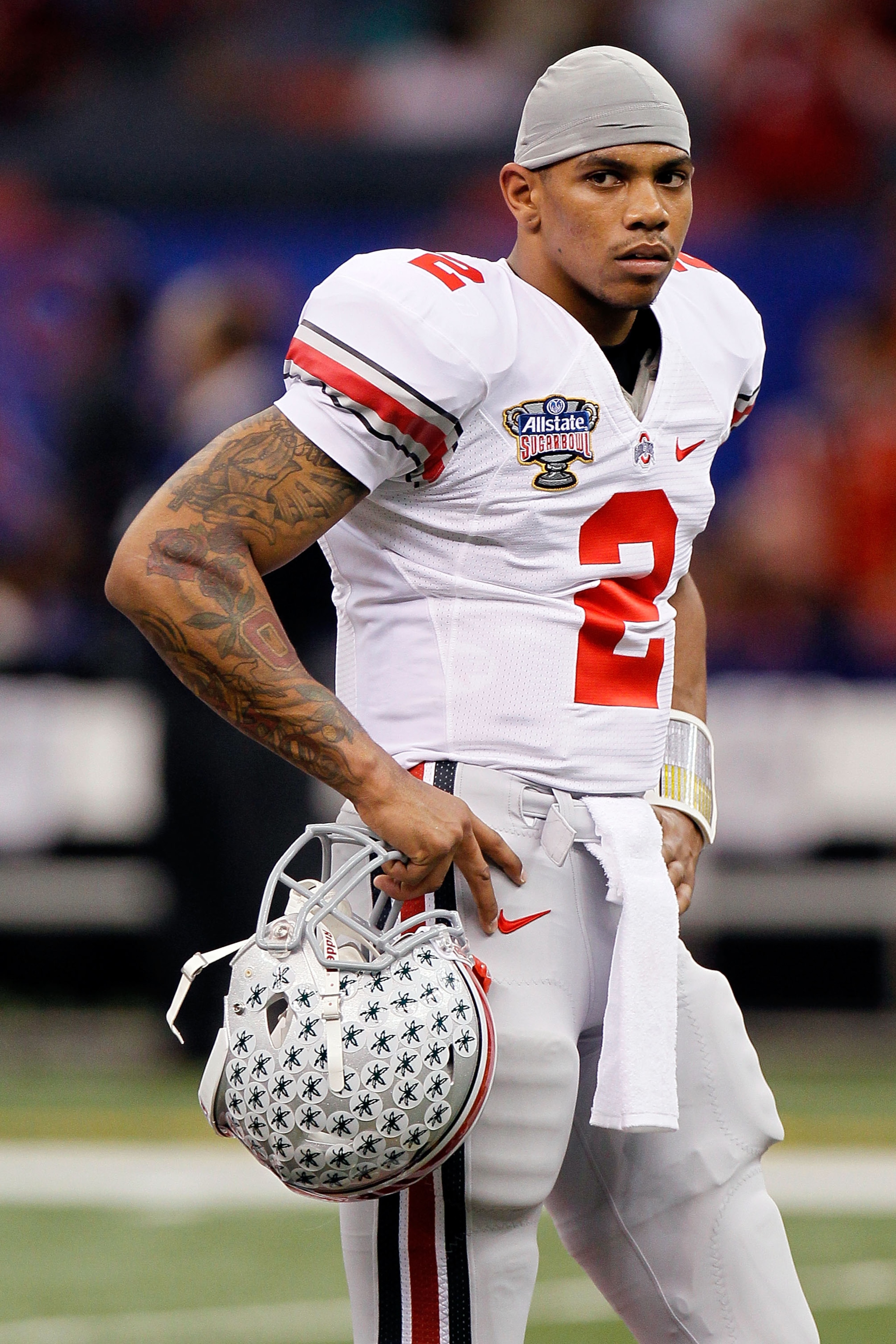 NEW ORLEANS, LA - JANUARY 04:  Quarterback Terrelle Pryor #2 of the Ohio State Buckeyes looks on during pregame warmups before taking on Arkansas Razorbacks in the Allstate Sugar Bowl at the Louisiana Superdome on January 4, 2011 in New Orleans, Louisiana