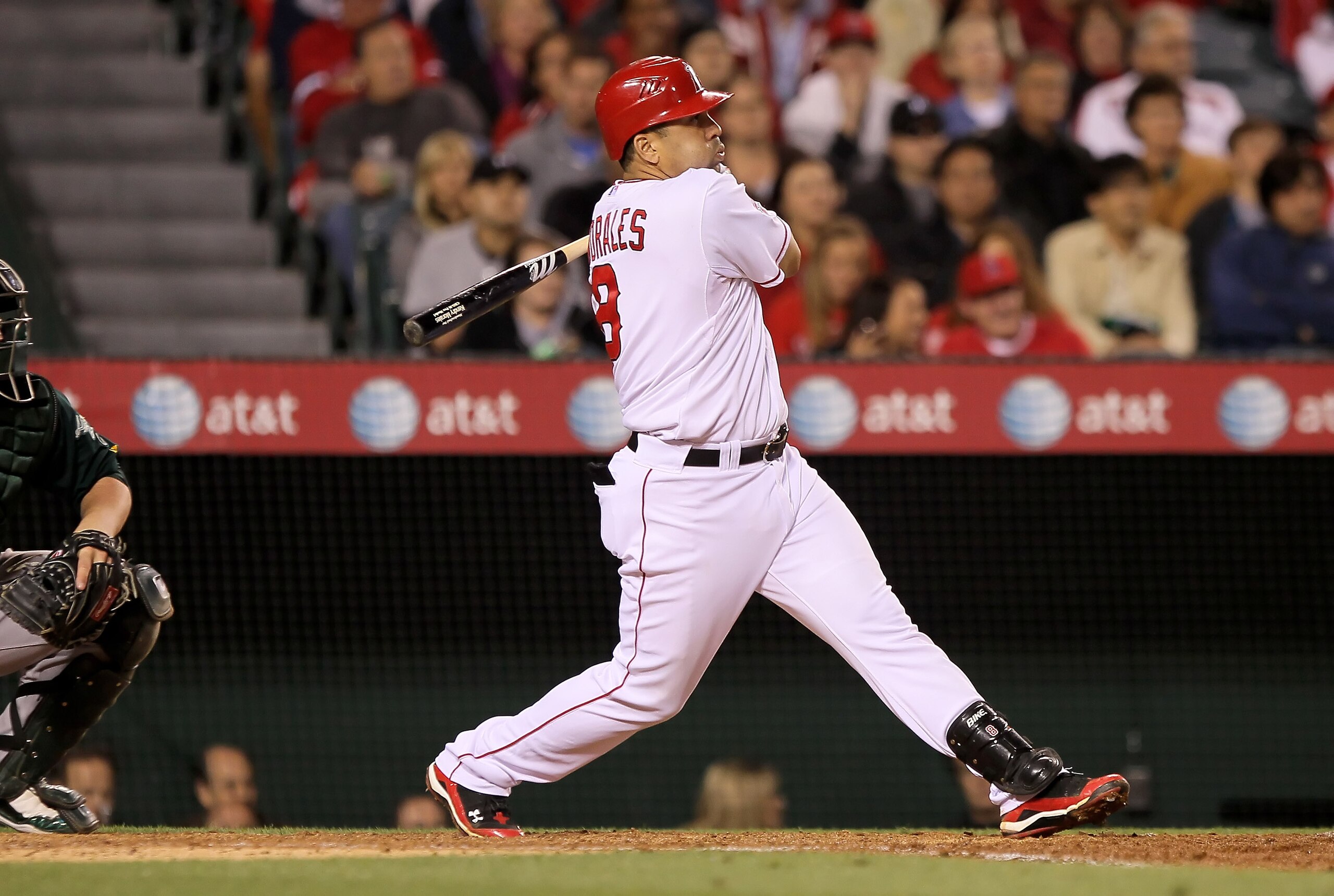 ANAHEIM, CA - MAY 14: Kendry Morales #8 of the Los Angeles Angels of Anaheim hits an RBI single scoring teammate Erick Aybar in the sixth inning against the Oakland Athletics at Angel Stadium on May 14, 2010 in Anaheim, California. The Angels defeated th ANAHEIM, CA - MAY 14: Kendry Morales #8 of the Los Angeles Angels of Anaheim hits an RBI single scoring teammate Erick Aybar in the sixth inning against the Oakland Athletics at Angel Stadium on May 14, 2010 in Anaheim, California. The Angels defeated th