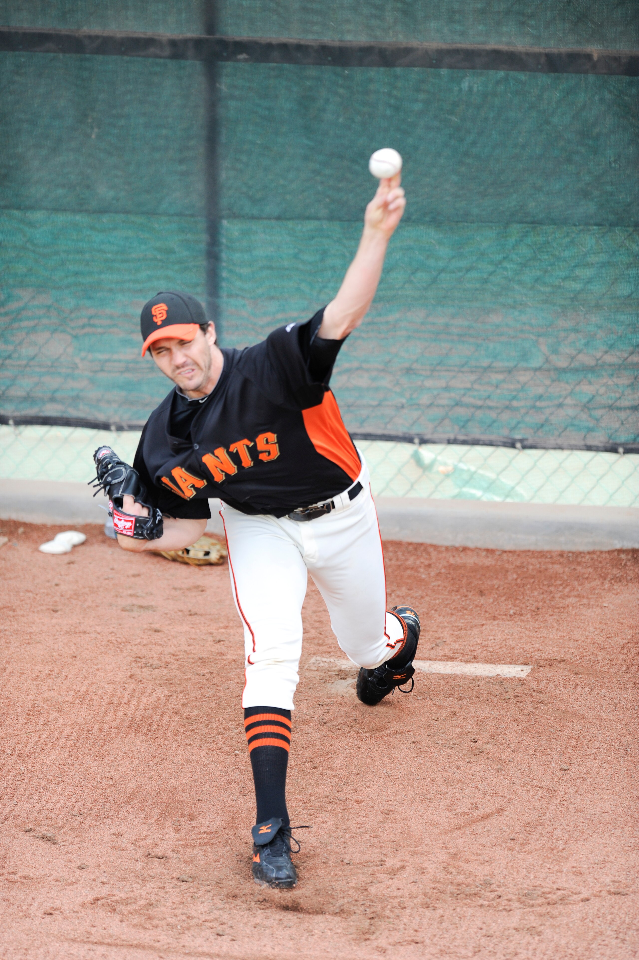 SCOTTSDALE, AZ - FEBRUARY 26: Barry Zito #75 of the San Francisco Giants pitches in the bullpen before a spring training game against the Los Angeles Dodgers  at Scottsdale Stadium on February 26, 2011 in Scottsdale, Arizona. (Photo by Rob Tringali/Getty