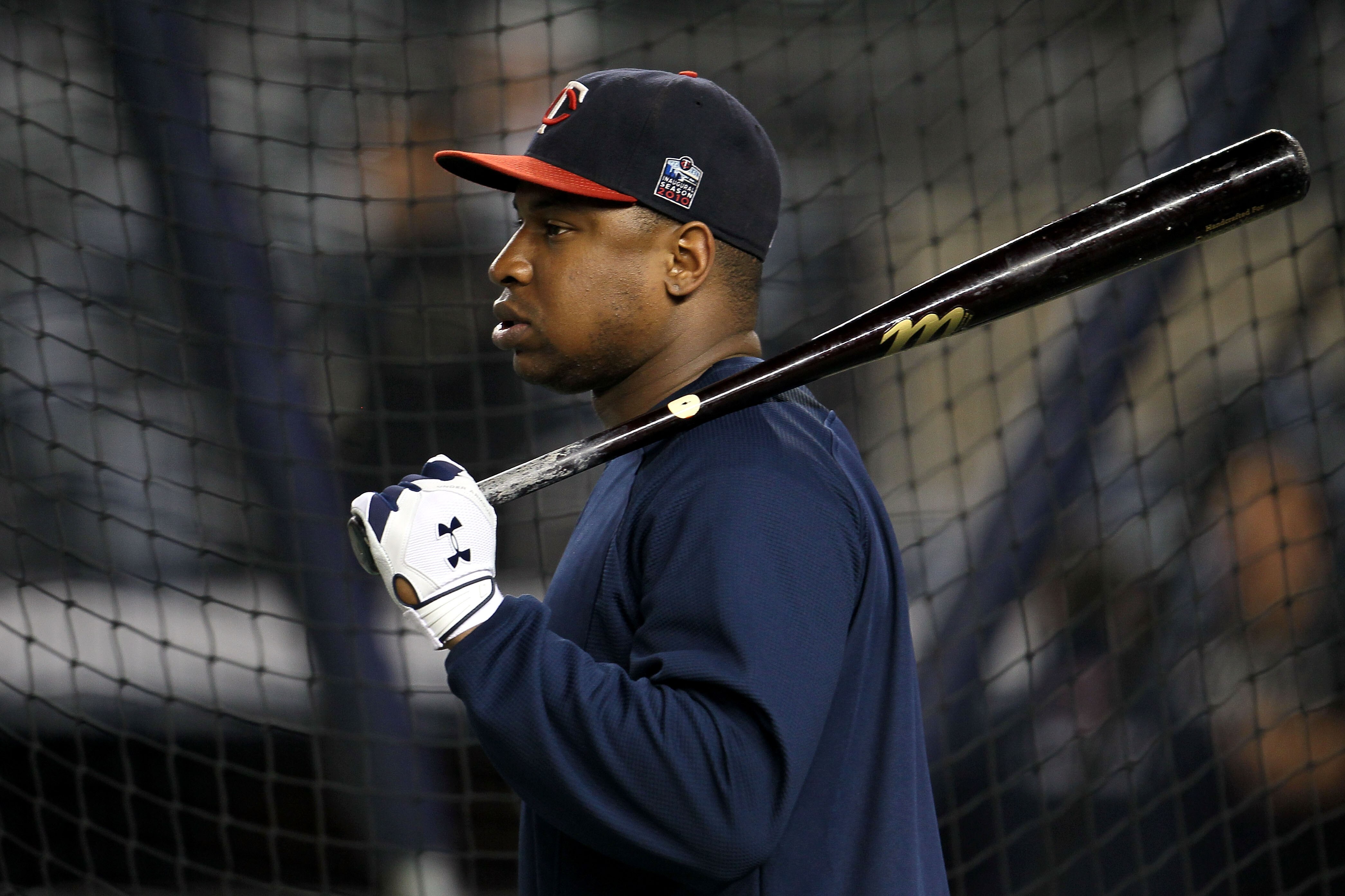 NEW YORK - OCTOBER 09:  Delmon Young #21 of the Minnesota Twins looks on during batting practice against the New York Yankees during Game Three of the ALDS part of the 2010 MLB Playoffs at Yankee Stadium on October 9, 2010 in the Bronx borough of New York