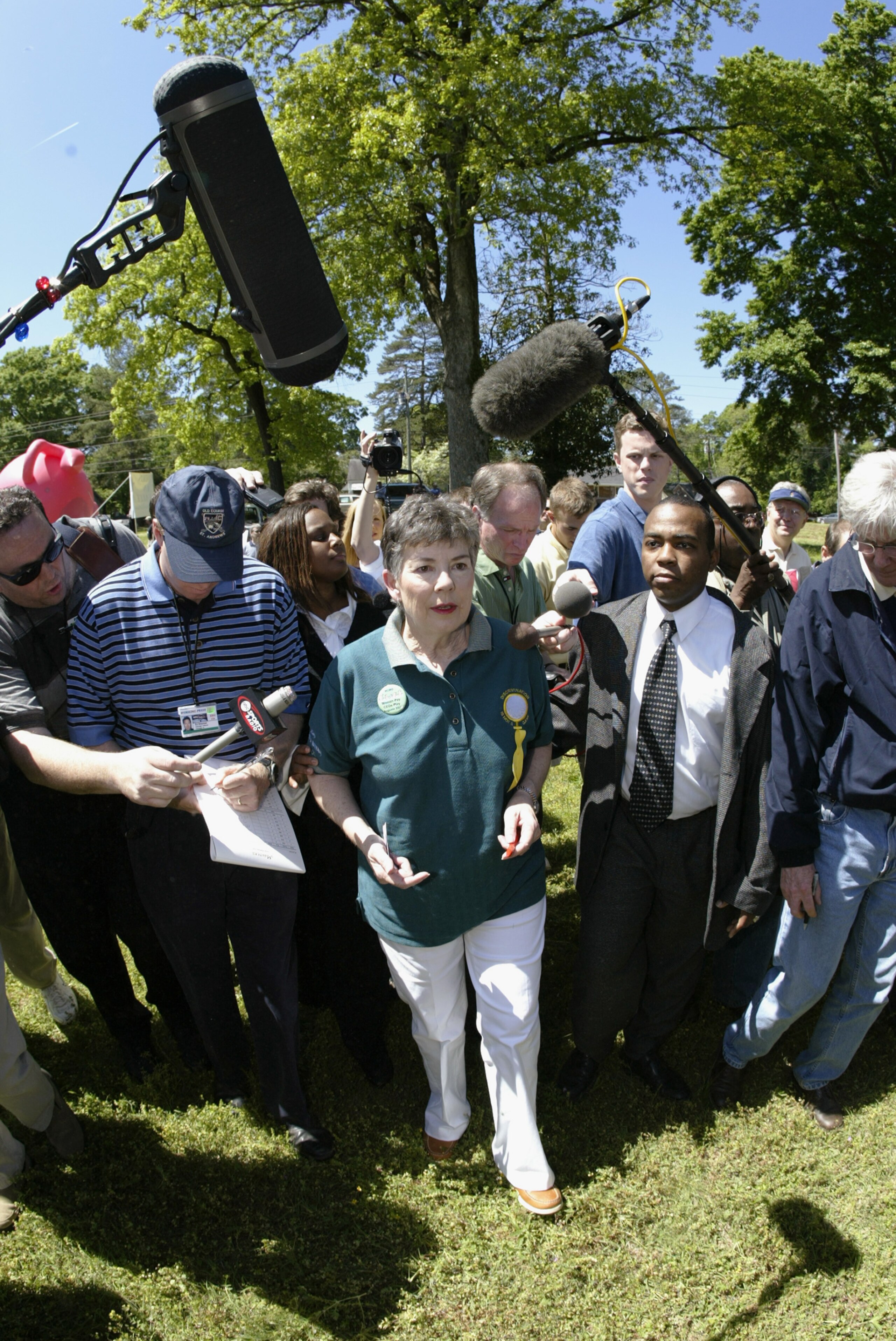 AUGUSTA, GA - APRIL 12:  Martha Burk, Chairwoman of the National Council of Women's Organizations, talks with the media during Masters week demonstrations on Washington Road outside the gates of Augusta National on April 12, 2003 in Augusta, Georgia.  (Ph