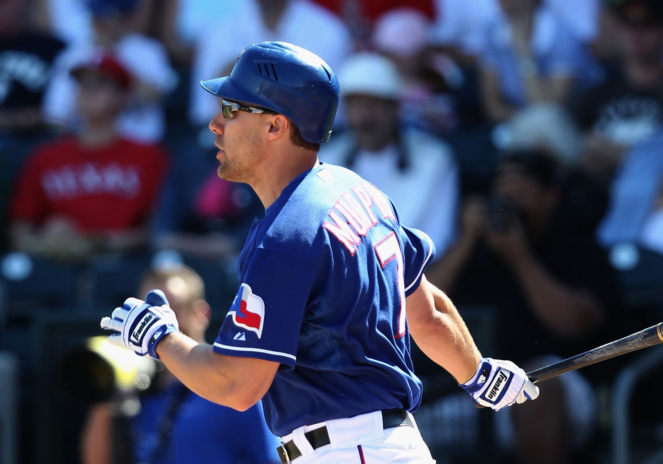 SURPRISE, AZ - MARCH 02: David Murphy #7 of the Texas Rangers hits a 3 run home run against the Los Angeles Angels of Anaheim during the second inning of the spring training game at Surprise Stadium on March 2, 2011 in Surprise, Arizona. (Photo by Chris SURPRISE, AZ - MARCH 02: David Murphy #7 of the Texas Rangers hits a 3 run home run against the Los Angeles Angels of Anaheim during the second inning of the spring training game at Surprise Stadium on March 2, 2011 in Surprise, Arizona. (Photo by Chris
