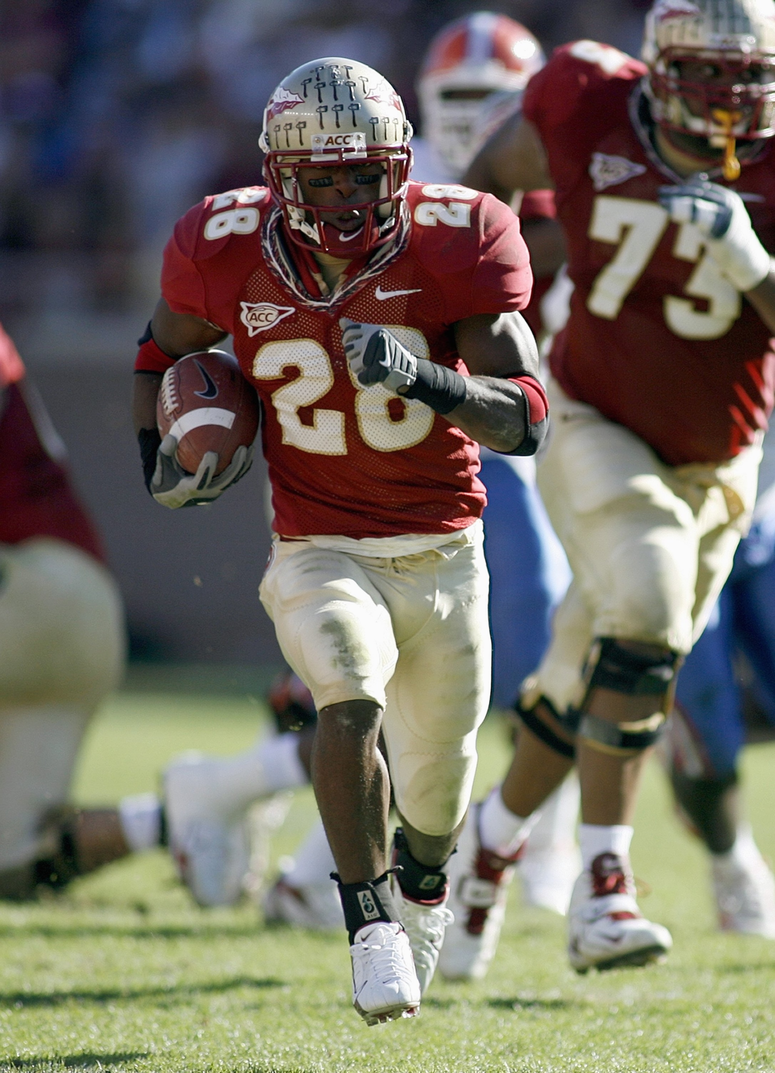 TALLAHASSEE, FL - NOVEMBER 25: Lorenzo Booker #28 of the Florida State Seminoles carries the ball during the game against the Florida Gators on November 25, 2006 at Doak Campbell Stadium in Tallahassee, Florida. (Photo by Marc Serota/Getty Images)