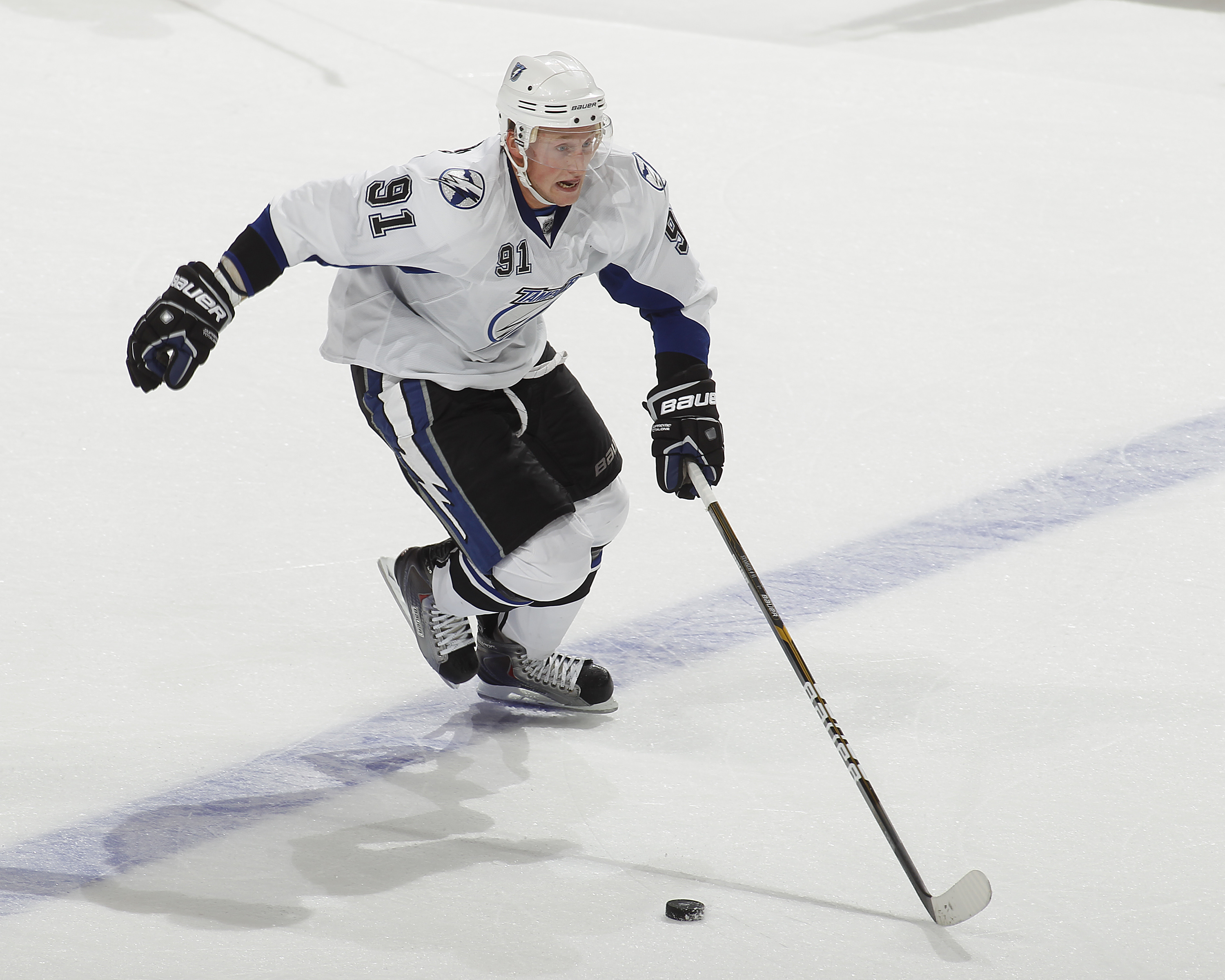 SUNRISE, FL - OCTOBER 1: Steven Stamkos #91 of the Tampa Bay Lightning caries the puck over the blue line against the Florida Panthers during a pre season game on October 1, 2010 at the BankAtlantic Center in Sunrise, Florida. The Lightning defeated the P