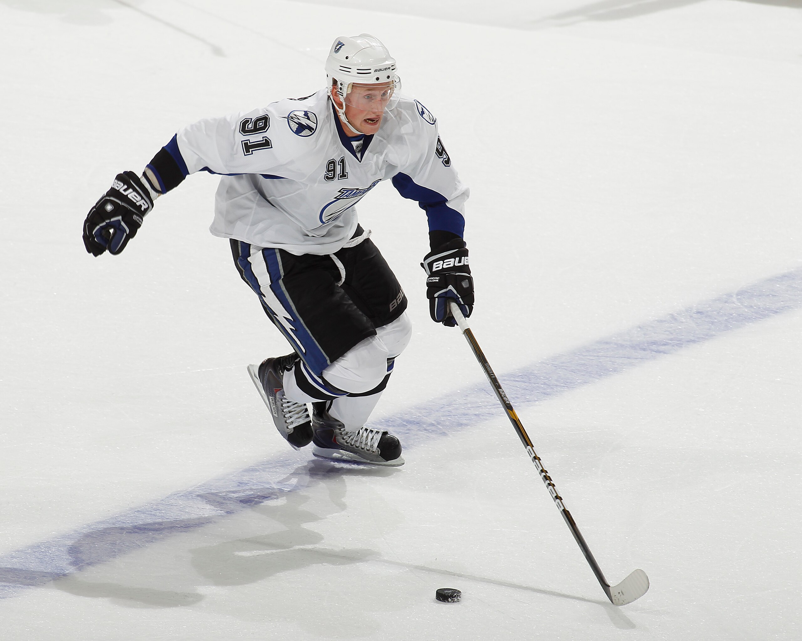 SUNRISE, FL - OCTOBER 1: Steven Stamkos #91 of the Tampa Bay Lightning caries the puck over the blue line against the Florida Panthers during a pre season game on October 1, 2010 at the BankAtlantic Center in Sunrise, Florida. The Lightning defeated the P