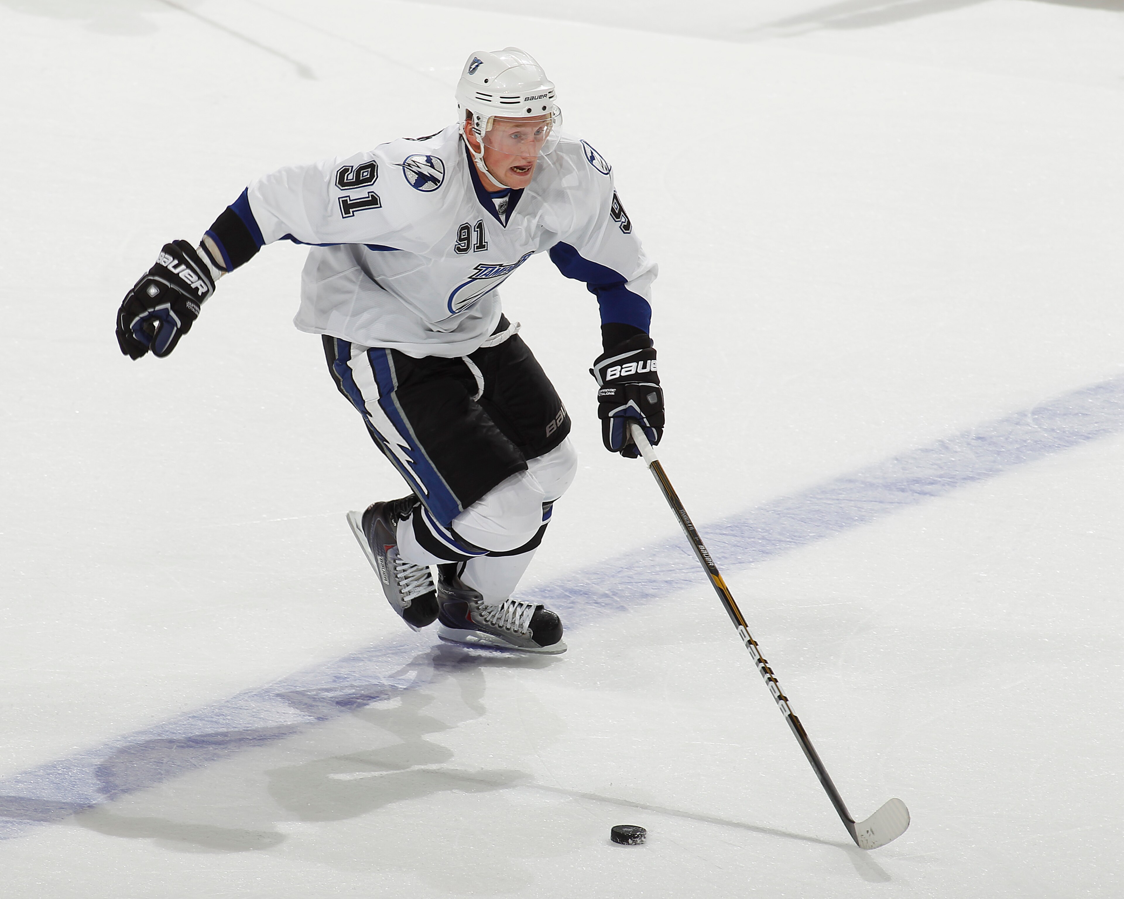 SUNRISE, FL - OCTOBER 1: Steven Stamkos #91 of the Tampa Bay Lightning caries the puck over the blue line against the Florida Panthers during a pre season game on October 1, 2010 at the BankAtlantic Center in Sunrise, Florida. The Lightning defeated the P