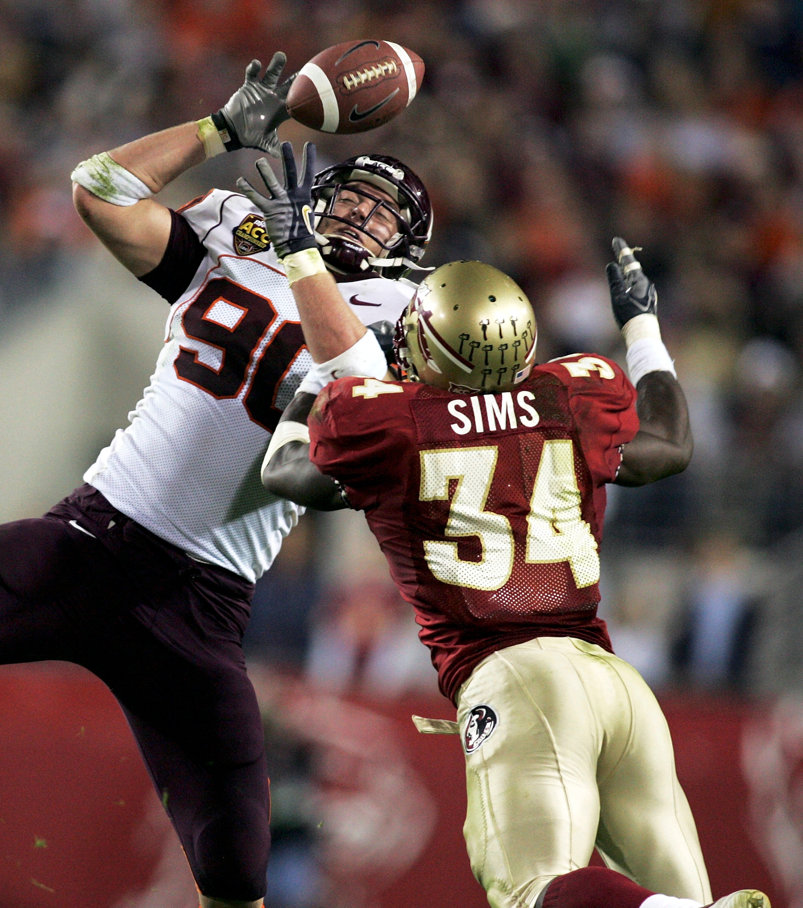 JACKSONVILLE, FL - DECEMBER 03: Linebacker Ernie Sims #34 of the Florida State Seminoles breaks up a pass intended for tight end Jeff King #90 of the Virginia Tech Hokies in the inaugural ACC Championship Game at Alltel Stadium on December 3, 2005 in Jack