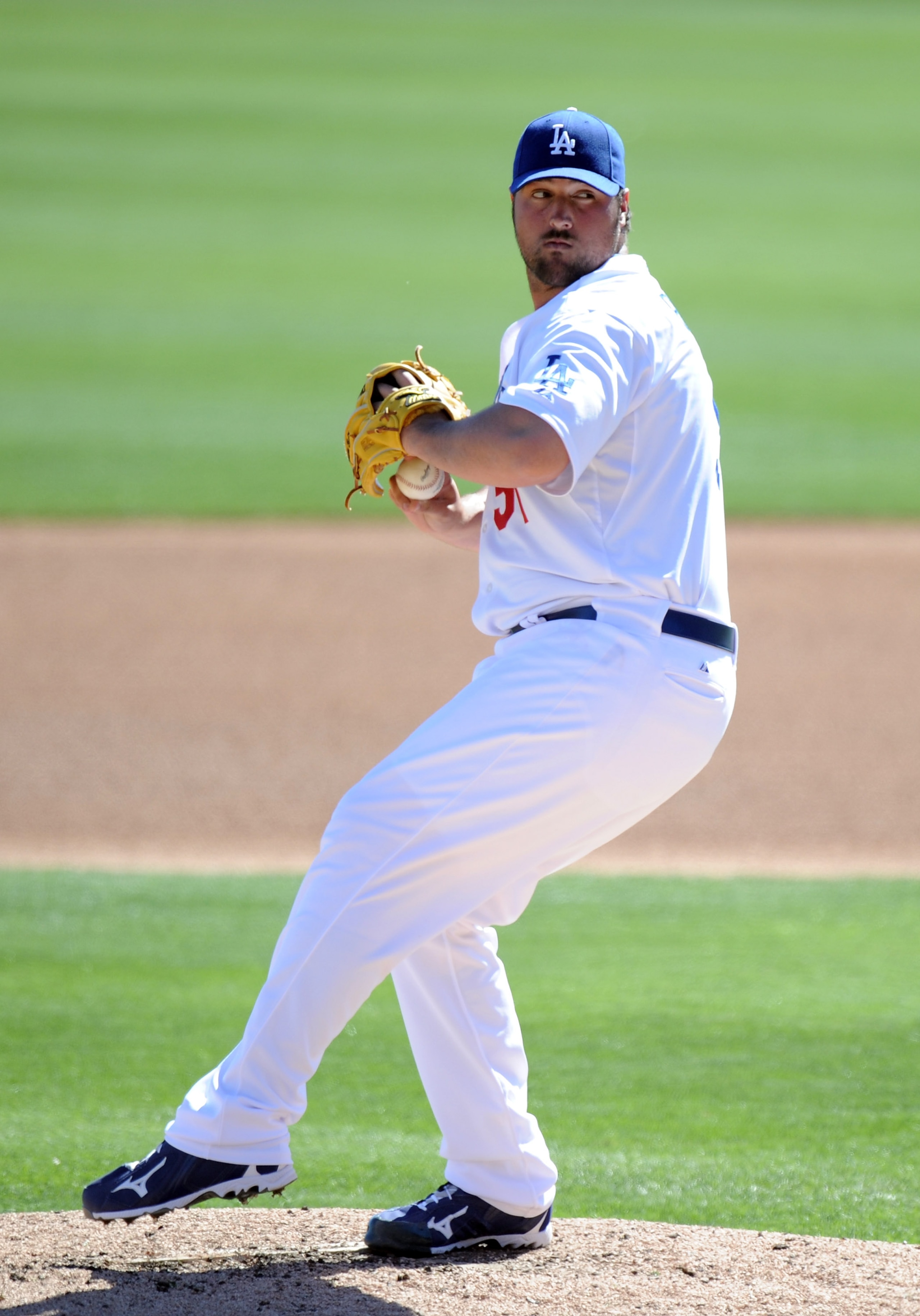 PHOENIX, AZ - FEBRUARY 28:  Jonathan Broxton #51 of the Los Angeles Dodgers pitches during spring training at Camelback Ranch on February 28, 2011 in Phoenix, Arizona.  (Photo by Harry How/Getty Images)