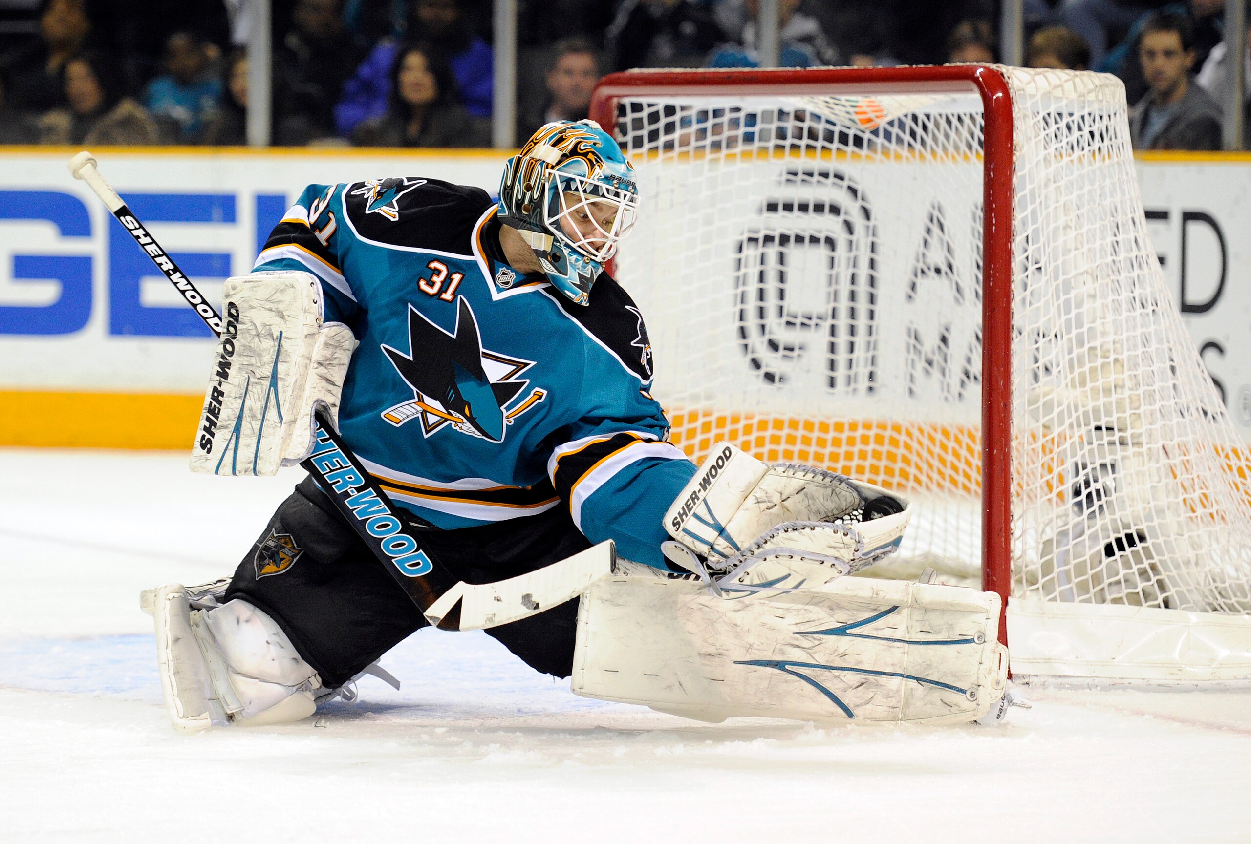 SAN JOSE, CA - MARCH 1: Antti Niemi #31 of the San Jose Sharks makes a glove hand save against the Colorado Avalanche in the first period during an NHL hockey game at the HP Pavilion on March 1, 2011 in San Jose, California. (Photo by Thearon W. Henderson