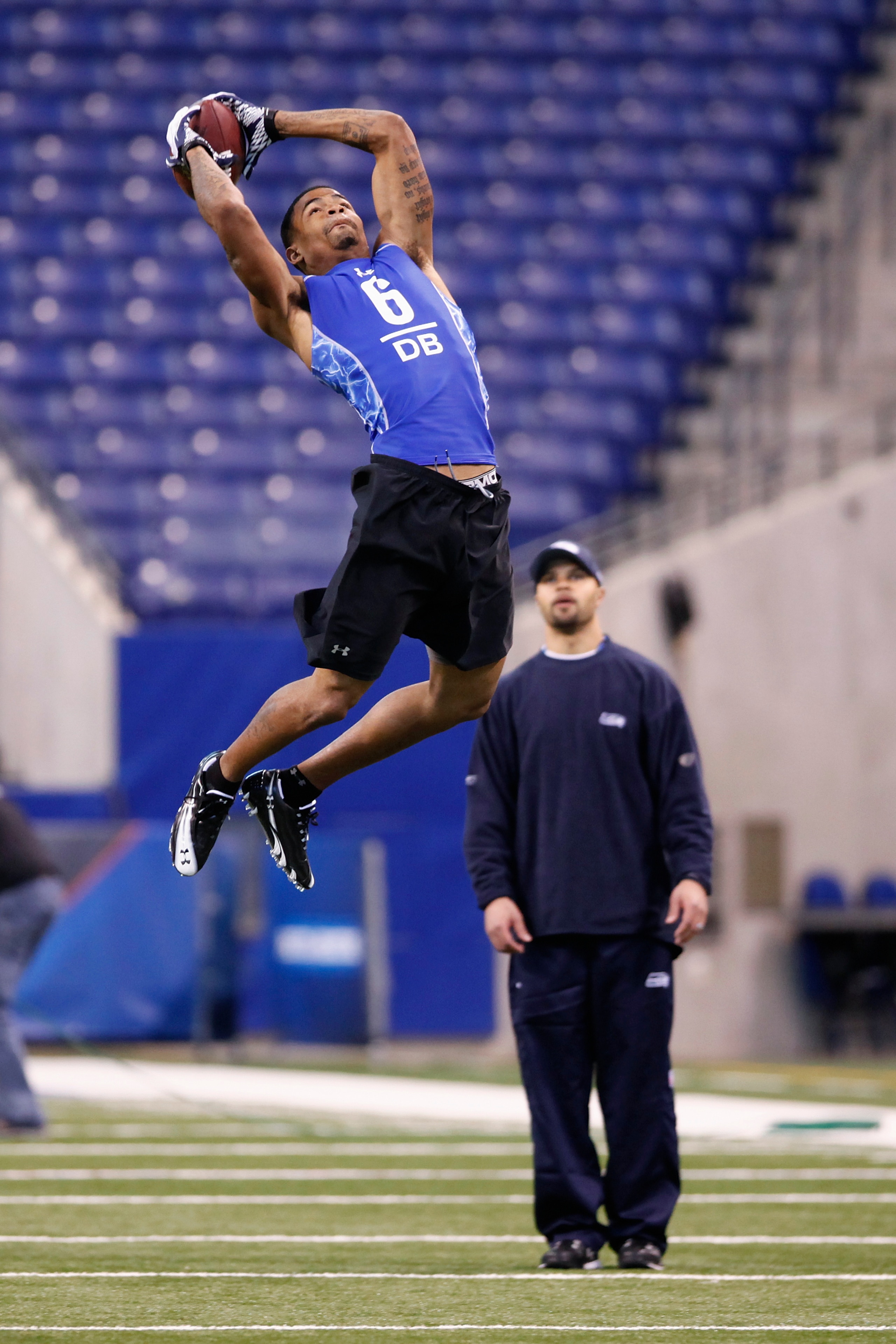 INDIANAPOLIS, IN - MARCH 1: Defensive back Curtis Brown #6 of Texas goes up for a pass during the 2011 NFL Scouting Combine at Lucas Oil Stadium on February 28, 2011 in Indianapolis, Indiana. (Photo by Joe Robbins/Getty Images)