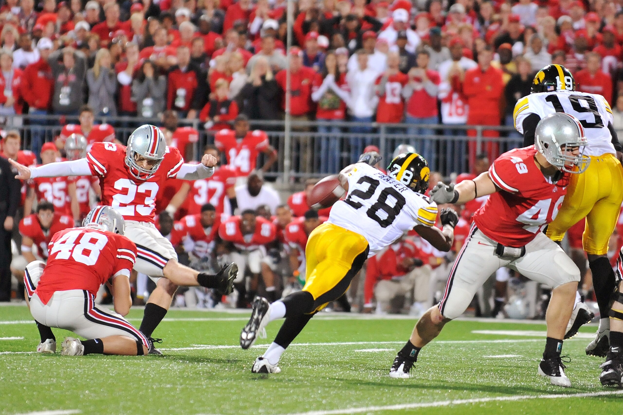 COLUMBUS, OH - NOVEMBER 14:  Kicker Devin Barclay #23 of the Ohio State Buckeyes connects on a 39-yard field goal in overtime against the Iowa Hawkeyes at Ohio Stadium on November 14, 2009 in Columbus, Ohio. The 27-24 Buckeyes win over the Hawkeyes put th