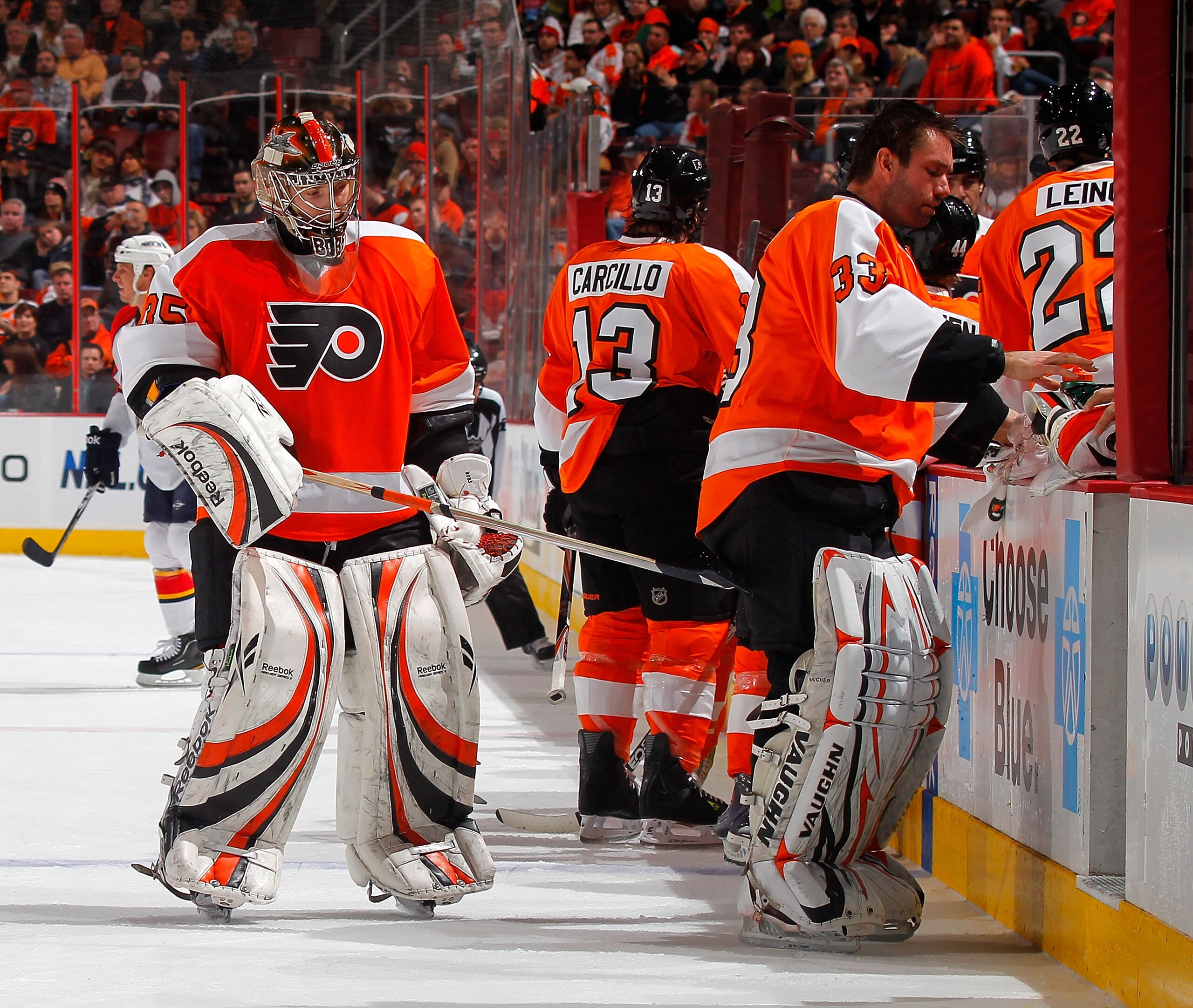 PHILADELPHIA, PA - DECEMBER 20:  Goalie Sergei Bobrovsky #35 of the Philadelphia Flyers gives his teammate Goalie Brian Boucher #33 a tap with his stick as Bobrovsky was just removed from the game after giving up four goals in a period and a half and Bouc