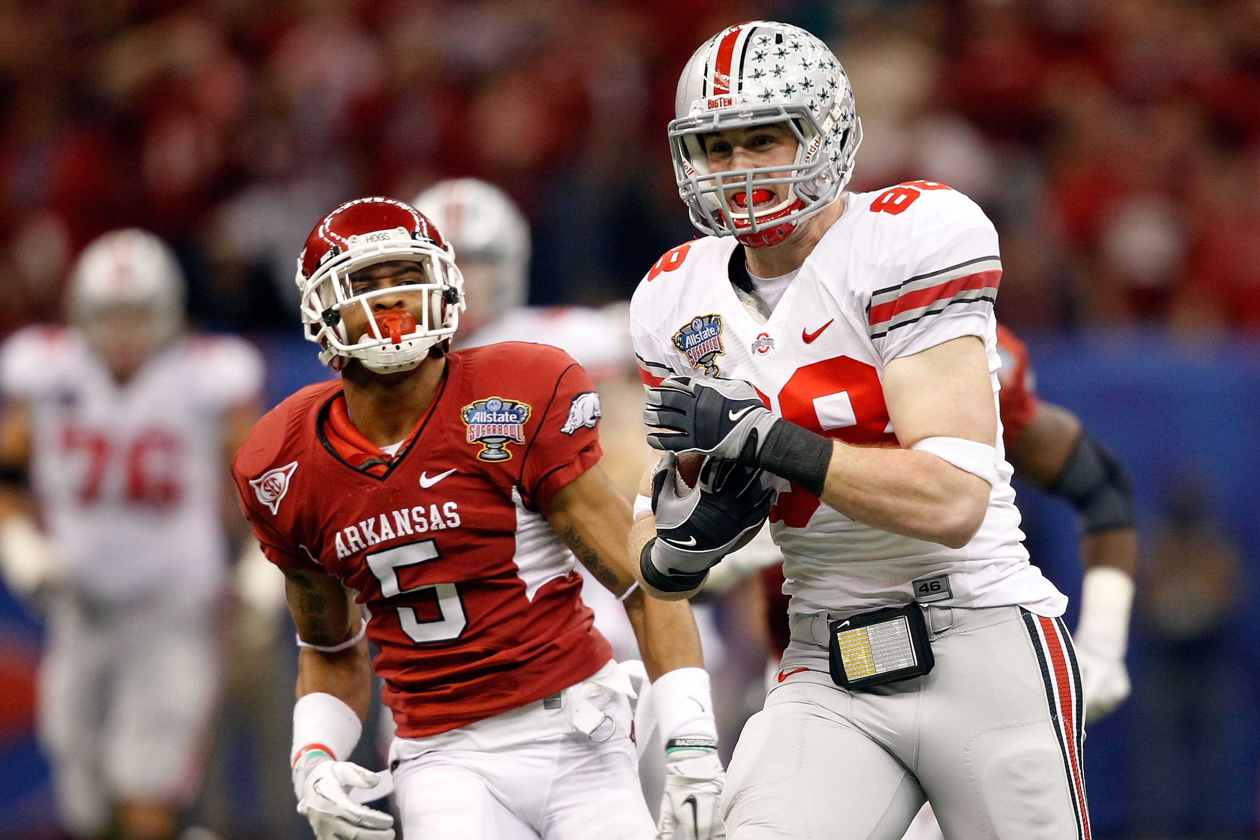NEW ORLEANS, LA - JANUARY 04:  Reid Fragel #88 of the Ohio State Buckeyes runs after a catch for 42-yards against the Arkansas Razorbacks in the second quarter during the Allstate Sugar Bowl at the Louisiana Superdome on January 4, 2011 in New Orleans, Lo