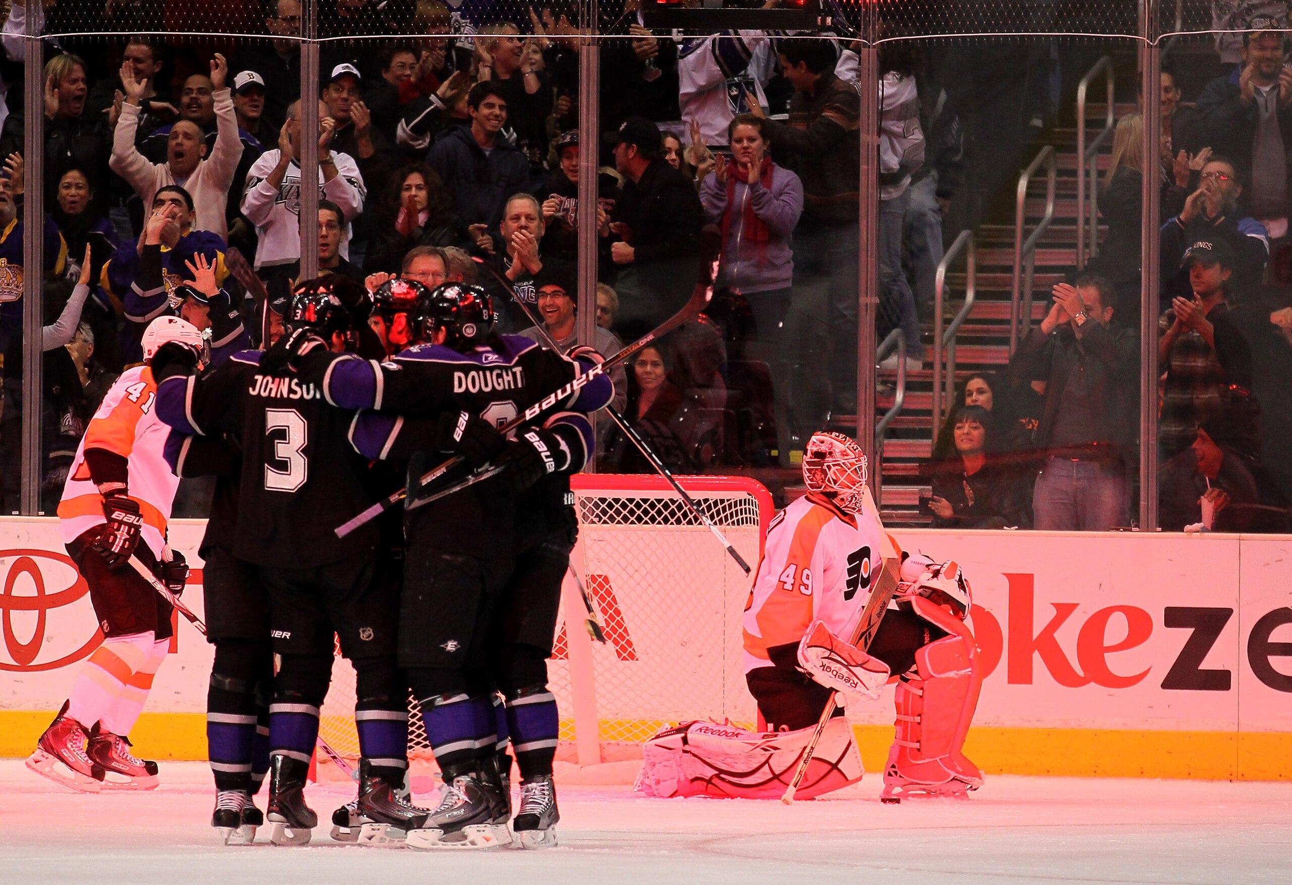 LOS ANGELES, CA - DECEMBER 30:  Goaltender Michael Leighton #49 of the Philadelphia Flyers reacts after giving up his second goal as the Los Angeles Kings celebrate at Staples Center on December 30, 2010 in Los Angeles, California.   (Photo by Stephen Dun