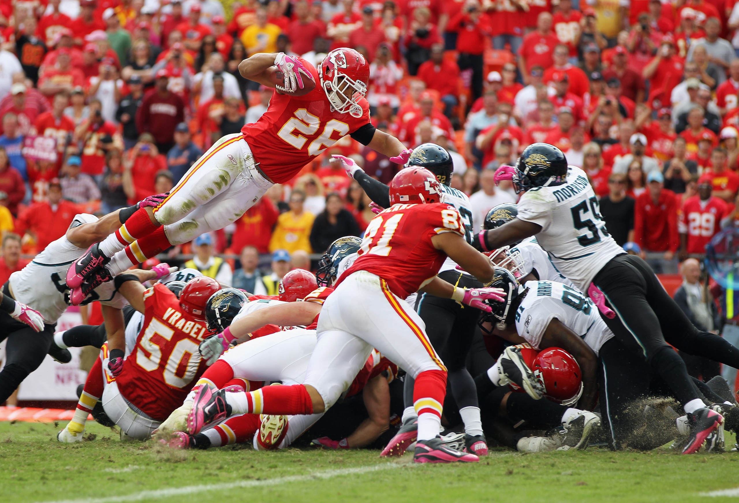 KANSAS CITY, MO - OCTOBER 24:  Running back Jackie Battle #26 of the Kansas City Chiefs carries the ball over the top of the defense to score a touchdown during the game against the Jacksonville Jaguars on October 24, 2010 at Arrowhead Stadium in Kansas C