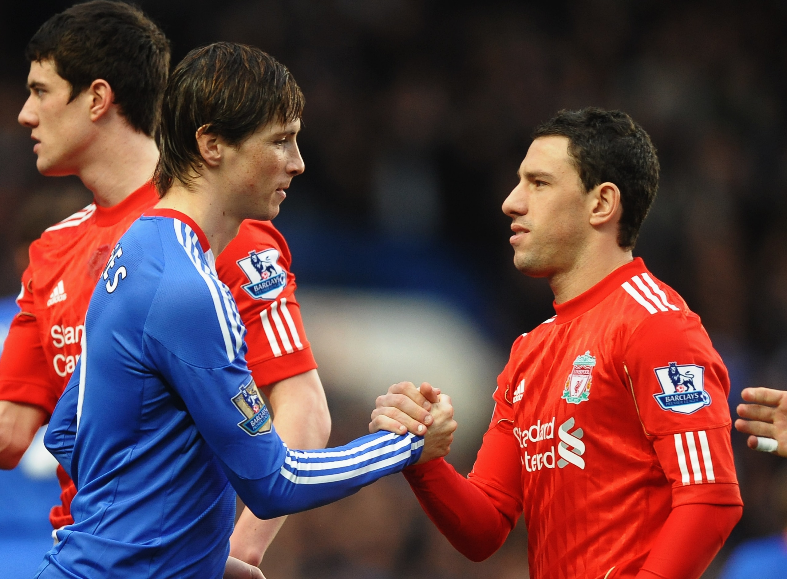 LONDON, ENGLAND - FEBRUARY 06: Fernando Torres of Chelsea shakes hands with former team mate Maxi Rodriguez of Liverpool prior to the Barclays Premier League match between Chelsea and Liverpool at Stamford Bridge on February 6, 2011 in London, England. LONDON, ENGLAND - FEBRUARY 06: Fernando Torres of Chelsea shakes hands with former team mate Maxi Rodriguez of Liverpool prior to the Barclays Premier League match between Chelsea and Liverpool at Stamford Bridge on February 6, 2011 in London, England.