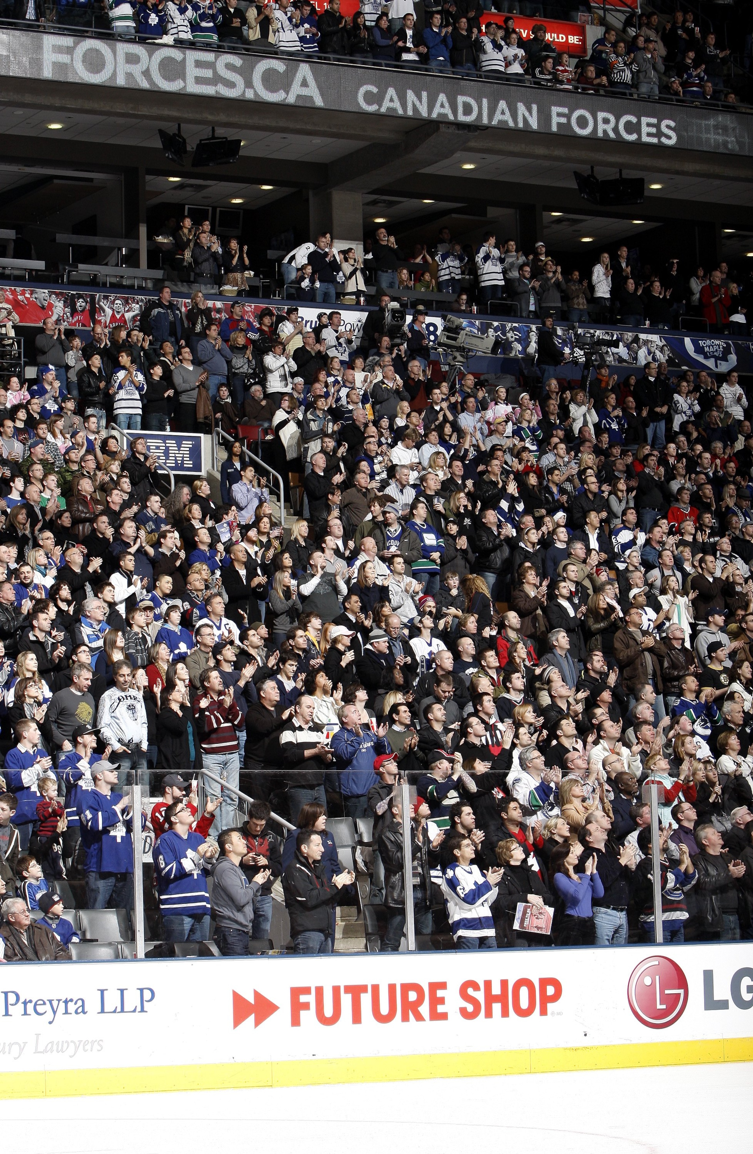 TORONTO - JANUARY 30: 18,000+ fans give a standing ovation to the Armed Forces personelle in attendance during the Toronto Maple Leafs vs The Vancouver Canucks game January 30, 2010 at the Air Canada Centre in Toronto, Ontario, Canada. (Photo by Abelimage