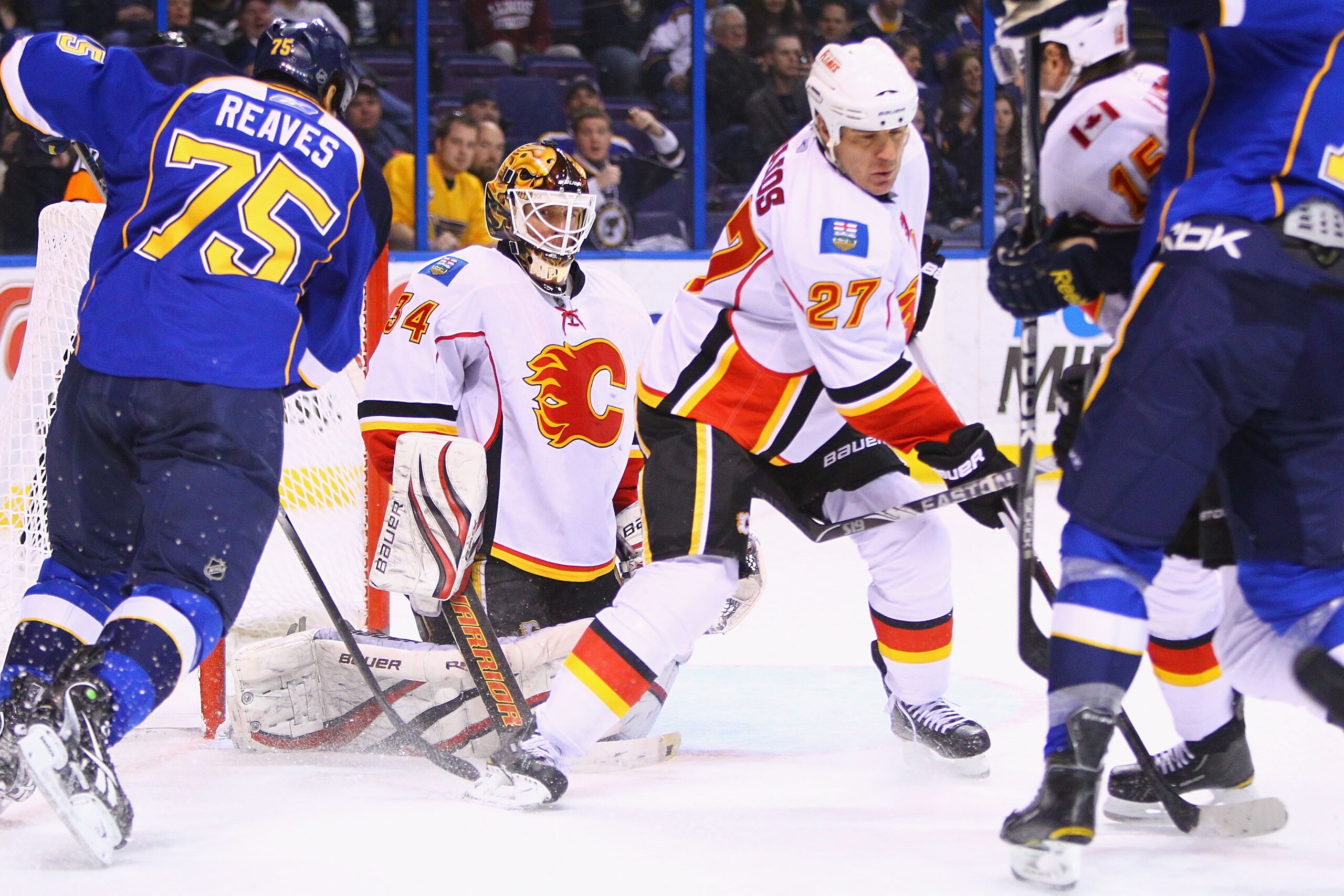 ST. LOUIS, MO - MARCH 1: Miikka Kiprusoff #34 of the Calgary Flames looks to make a save against the St. Louis Blues at the Scottrade Center on March 1, 2011 in St. Louis, Missouri.  (Photo by Dilip Vishwanat/Getty Images)
