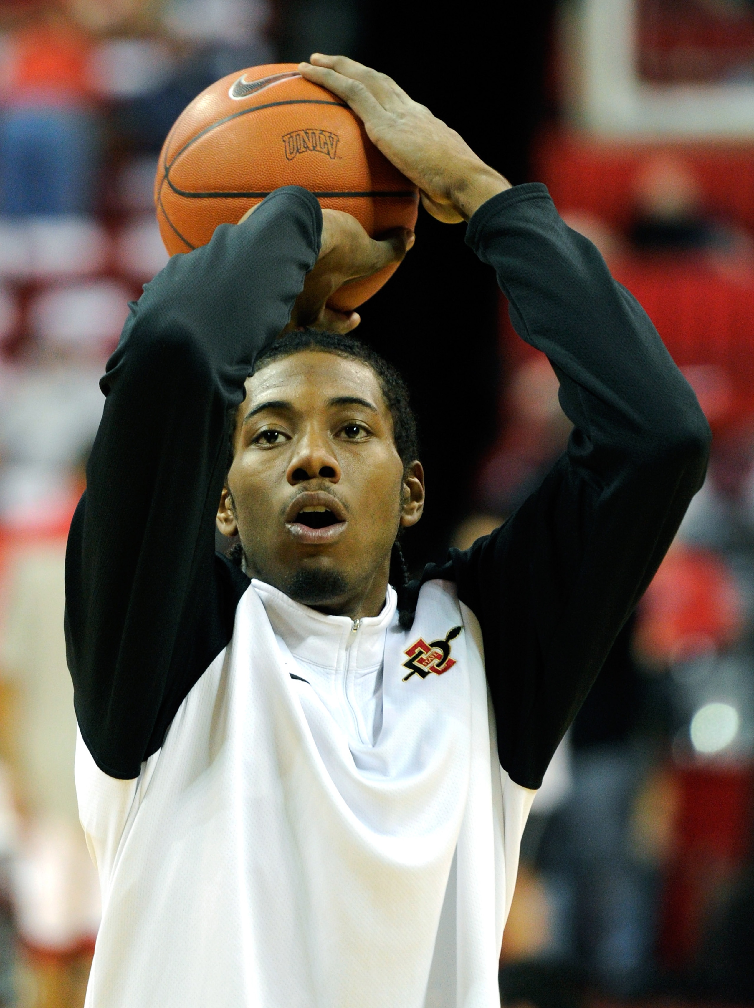 LAS VEGAS, NV - FEBRUARY 12:  Kawhi Leonard #15 of the San Diego State Aztecs shoots during warmups before a game against the UNLV Rebels at the Thomas & Mack Center February 12, 2011 in Las Vegas, Nevada. San Diego State won 63-57.  (Photo by Ethan Mille