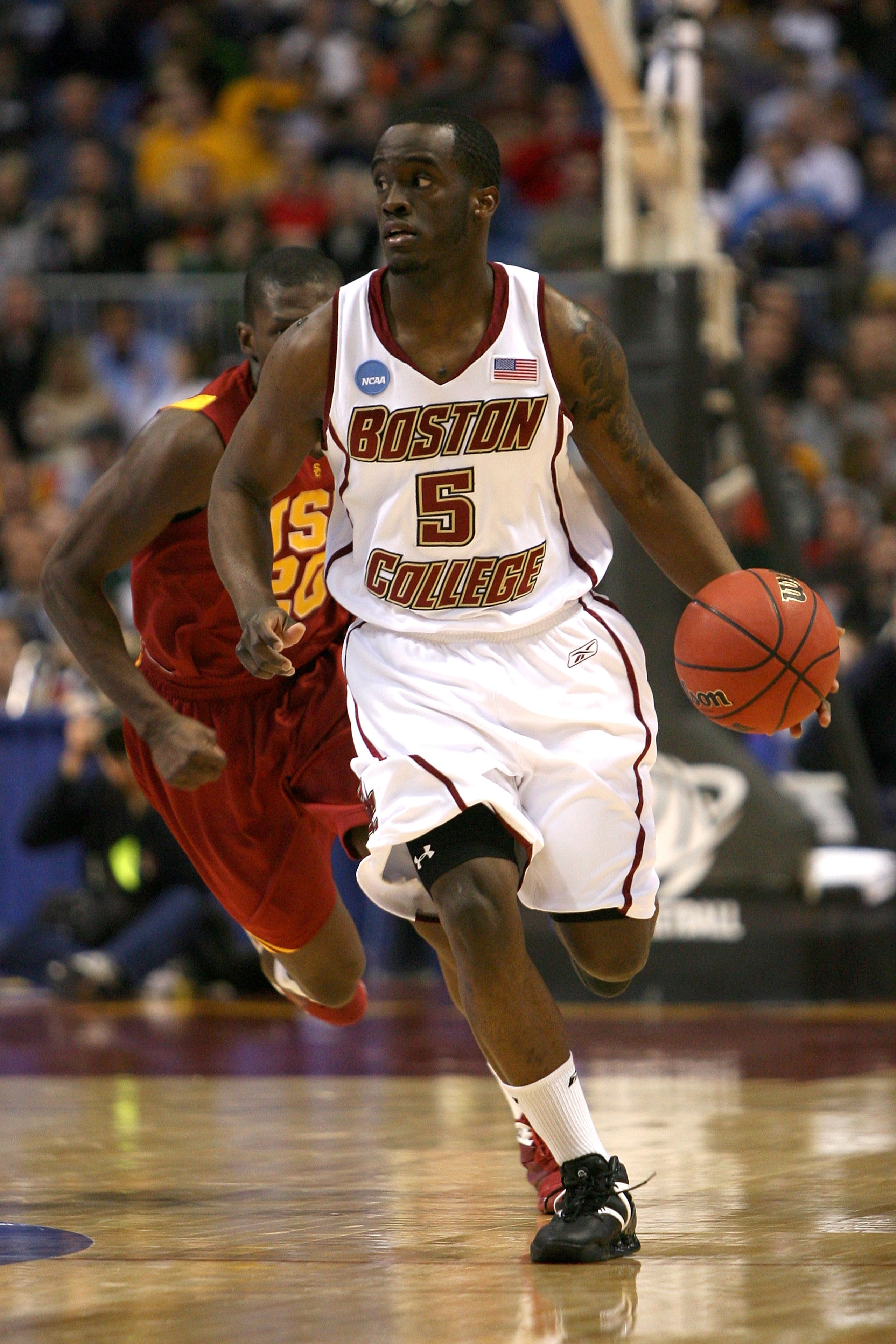 MINNEAPOLIS - MARCH 20:  Biko Paris #5 of the Boston College Eagles brings the ball up court against the USC Trojans during the first round of the NCAA Division I Men's Basketball Tournament at the Hubert H. Humphrey Metrodome on March 20, 2009 in Minneap