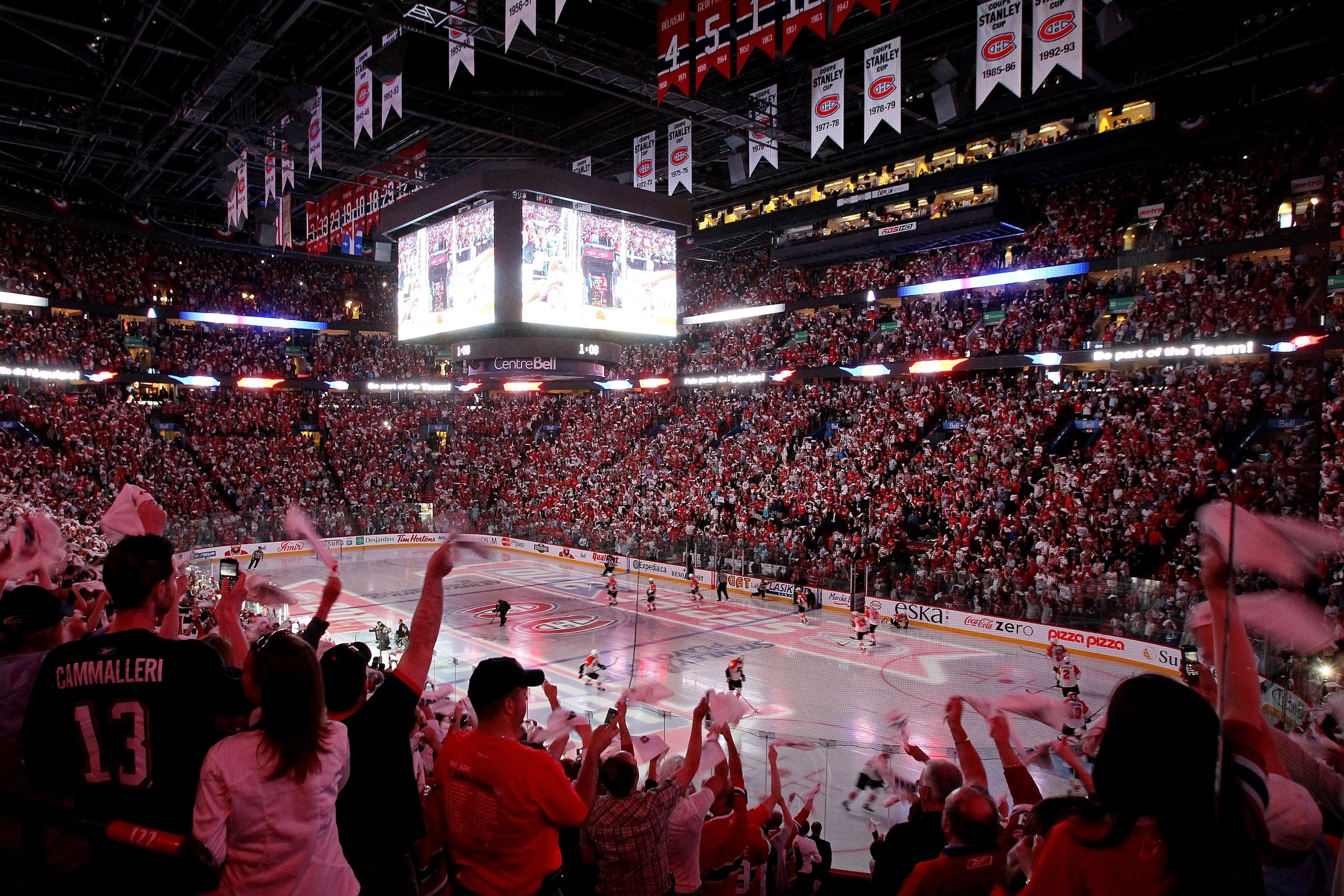 MONTREAL, QC - MAY 22:  Fans cheer as the Montreal Canadiens are introduced before playing against the Philadelphia Flyers in Game 3 of the Eastern Conference Finals during the 2010 NHL Stanley Cup Playoffs at Bell Centre on May 20, 2010 in Montreal, Cana