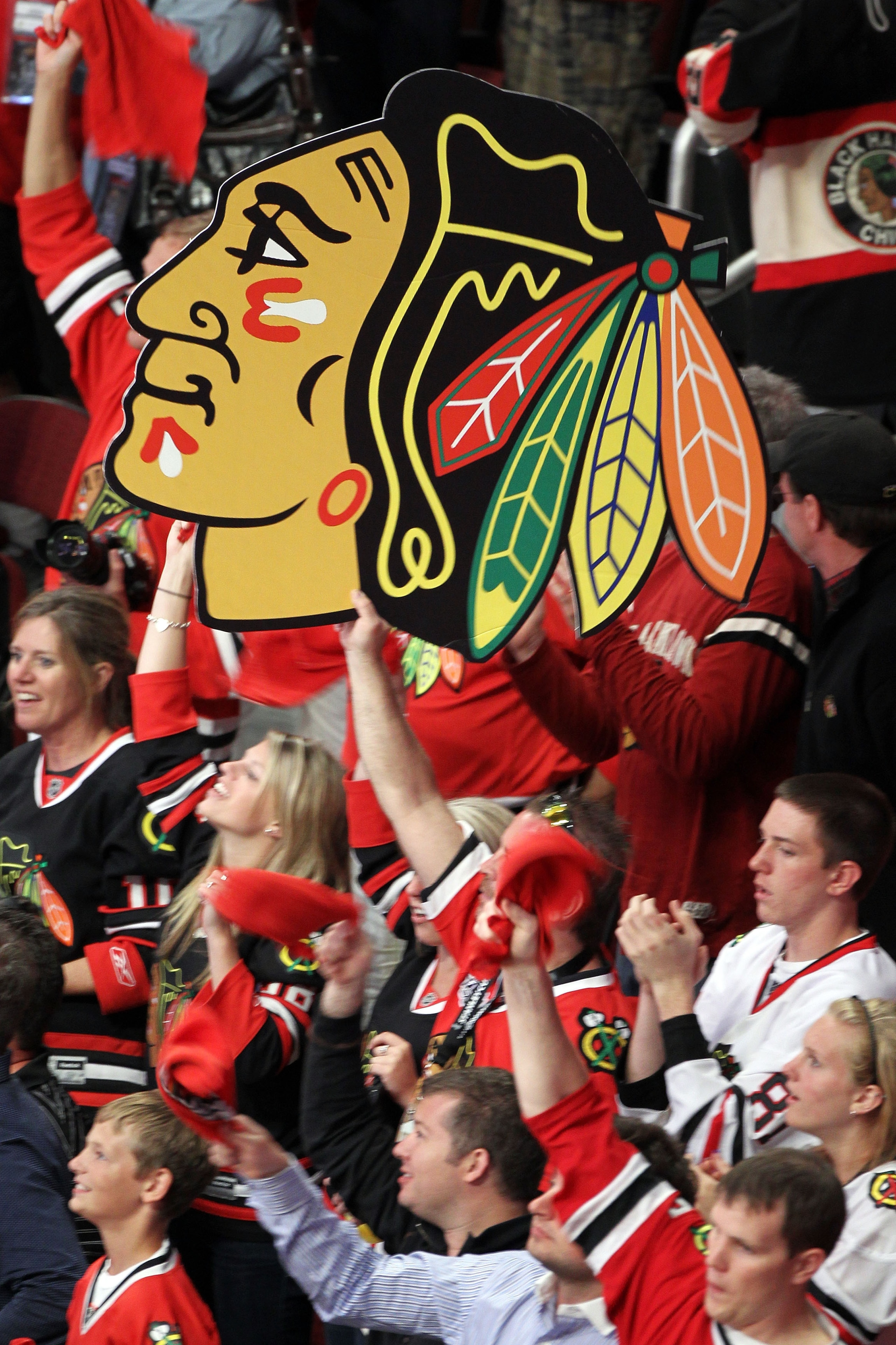 CHICAGO - JUNE 06:  Fans of the Chicago Blackhawks support their team in Game Five of the 2010 NHL Stanley Cup Final against the Philadelphia Flyers at the United Center on June 6, 2010 in Chicago, Illinois.  (Photo by Andre Ringuette/Getty Images)