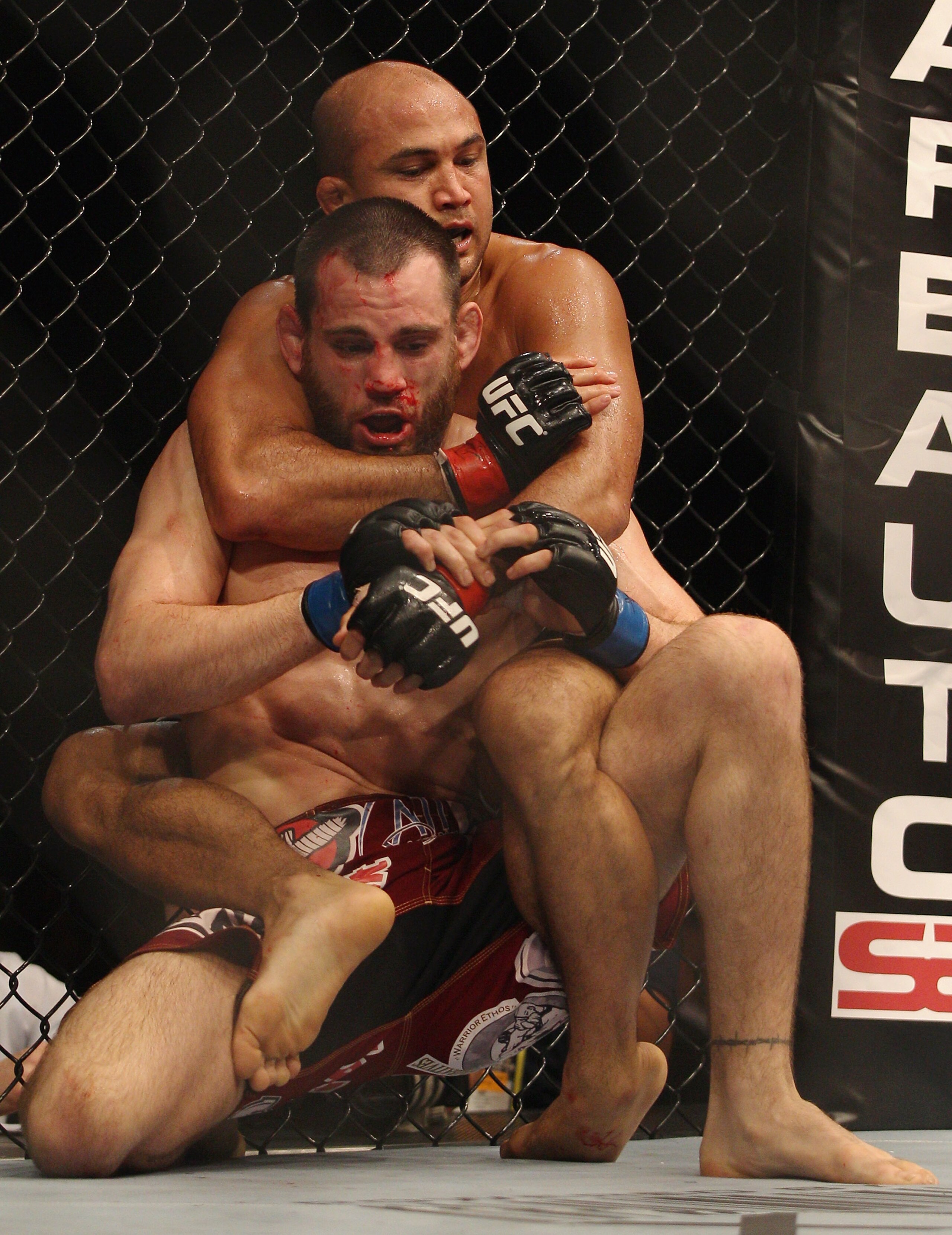SYDNEY, AUSTRALIA - FEBRUARY 27: BJ Penn of the USA attempts to choke Jon Fitch of the USA during their welterweight bout part of UFC 127 at Acer Arena on February 27, 2011 in Sydney, Australia. (Photo by Mark Kolbe/Getty Images) SYDNEY, AUSTRALIA - FEBRUARY 27: BJ Penn of the USA attempts to choke Jon Fitch of the USA during their welterweight bout part of UFC 127 at Acer Arena on February 27, 2011 in Sydney, Australia. (Photo by Mark Kolbe/Getty Images)