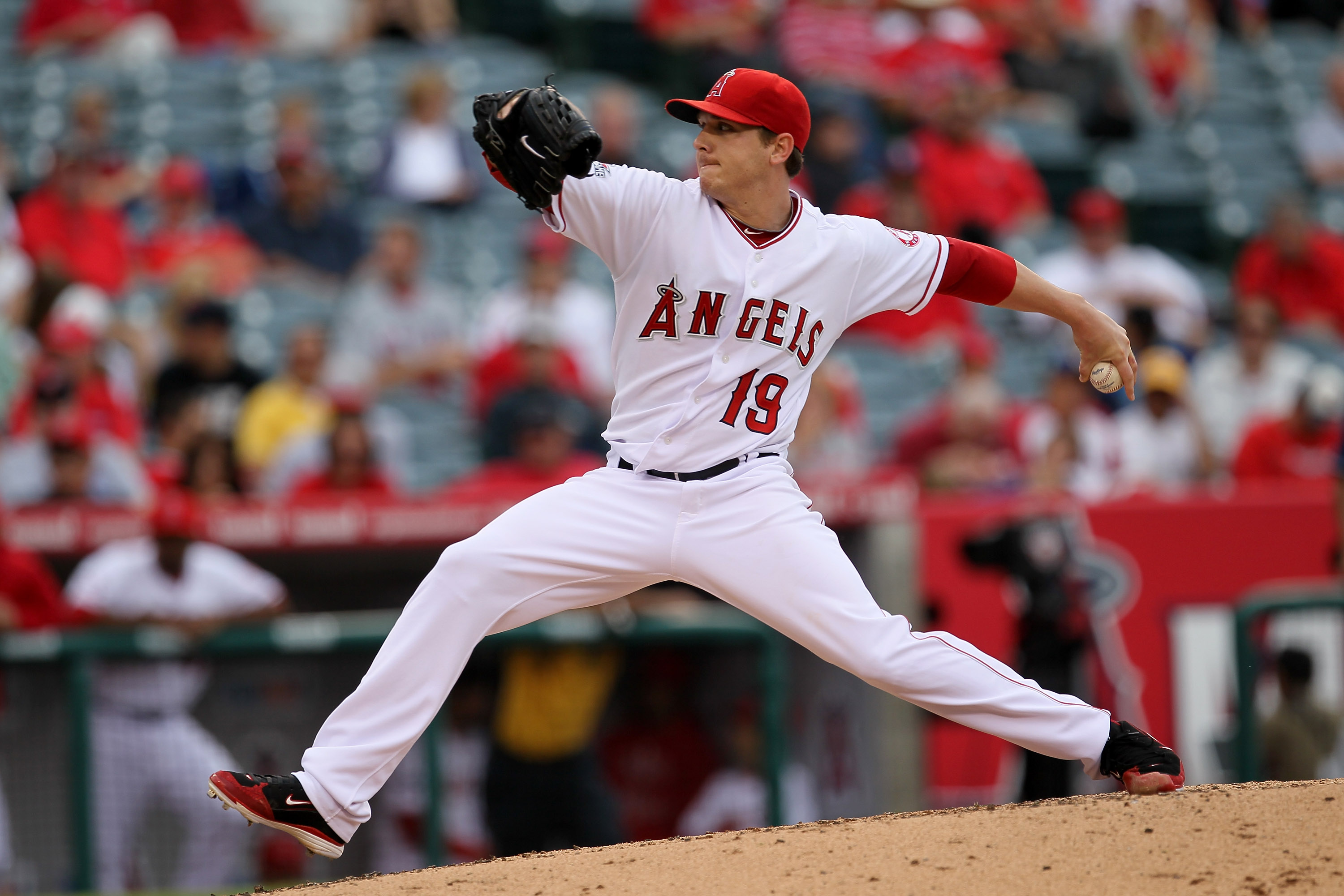 ANAHEIM, CA - SEPTEMBER 08:  Scott Zazmir #19 of the Los Angeles Angels of Anaheim throws a pitch against the Cleveland Indians on September 8, 2010 at Angel Stadium in Anaheim, California.  (Photo by Stephen Dunn/Getty Images)