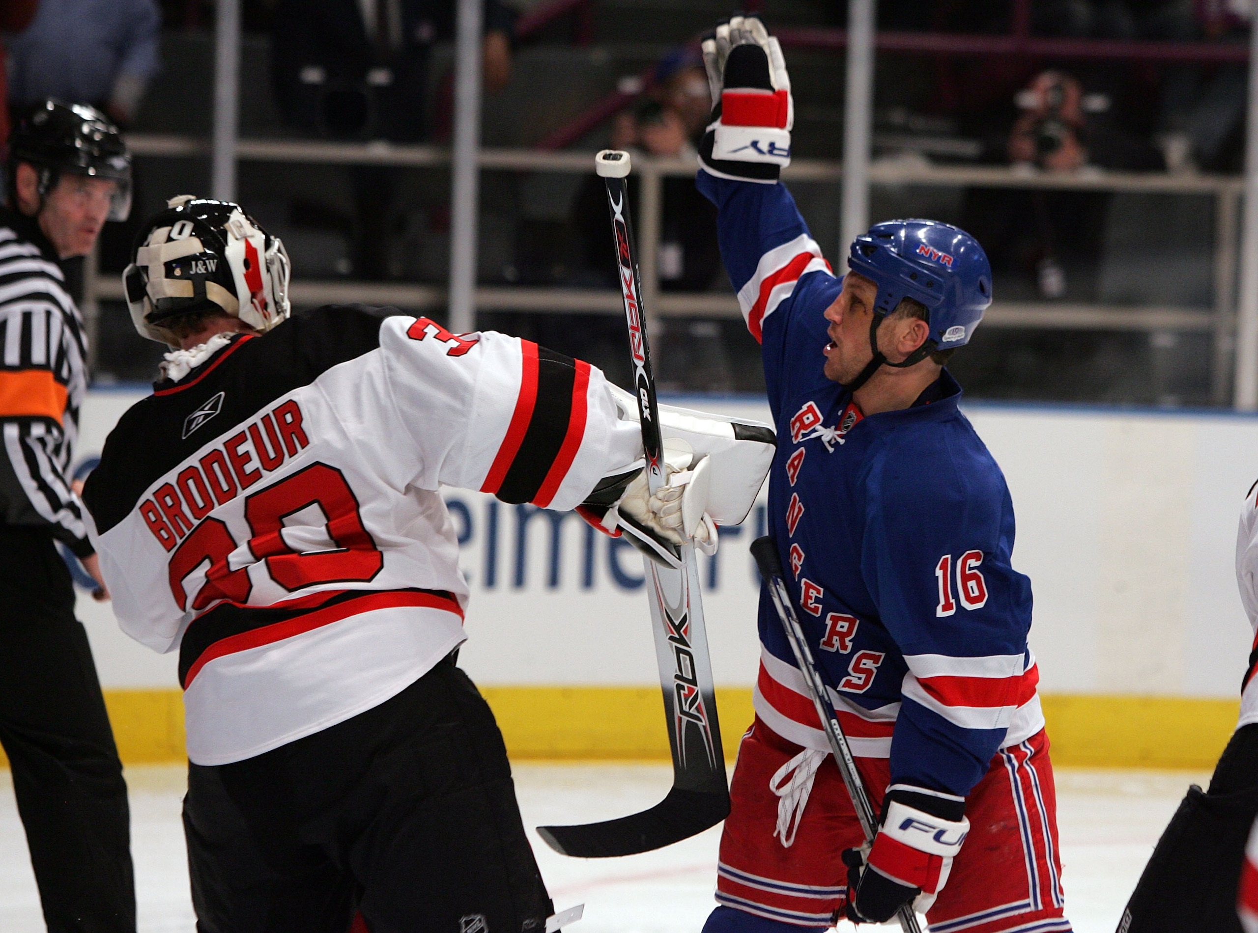 NEW YORK - APRIL 13: Sean Avery #16 of the New York Rangers tries to screen Martin Brodeur #30 of the New Jersey Devils during game three of the 2008 NHL Eastern Conference Quarterfinals on April 13, 2008 at Madison Square Garden in New York City. (Photo NEW YORK - APRIL 13: Sean Avery #16 of the New York Rangers tries to screen Martin Brodeur #30 of the New Jersey Devils during game three of the 2008 NHL Eastern Conference Quarterfinals on April 13, 2008 at Madison Square Garden in New York City. (Photo