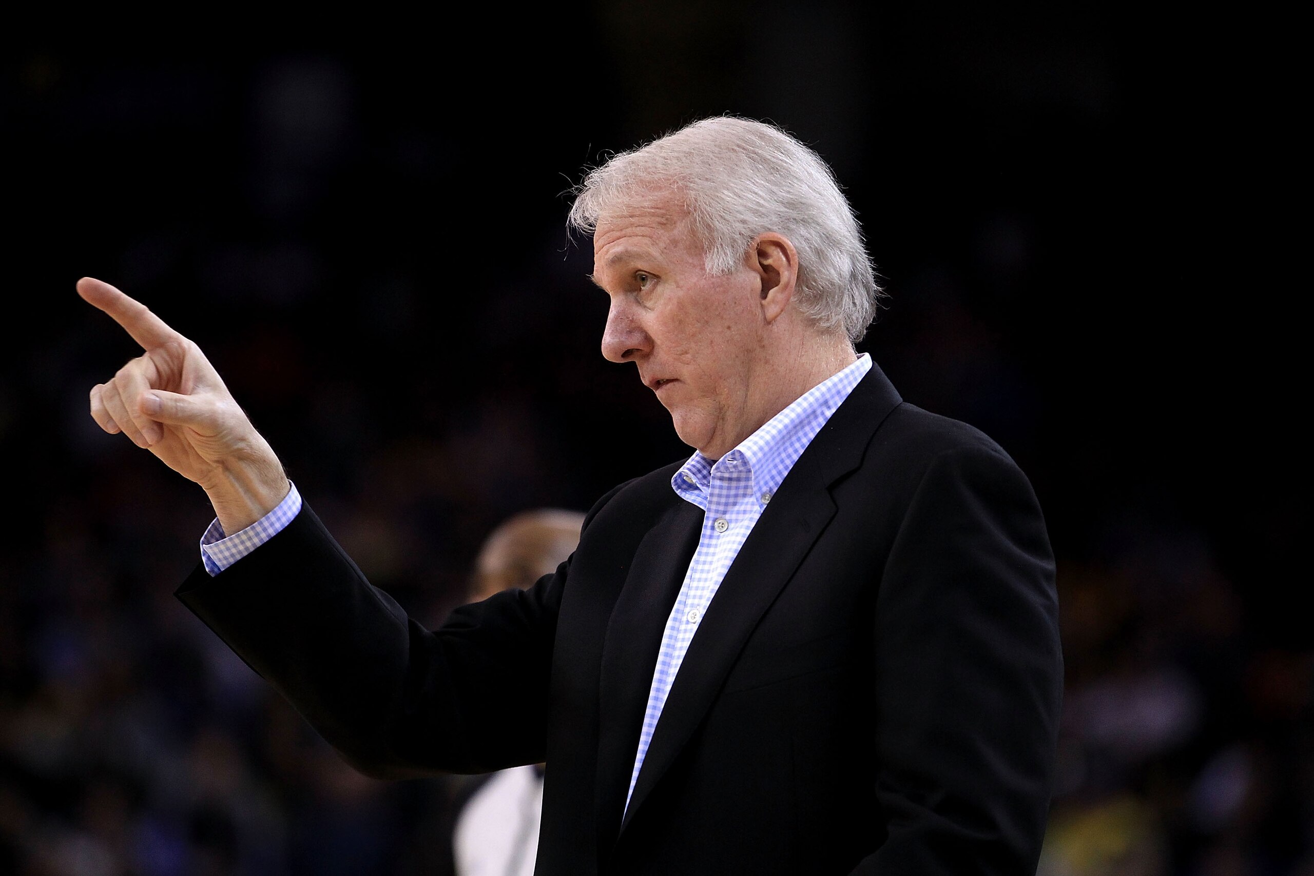 OAKLAND, CA - JANUARY 24:  Gregg Popovich of the San Antonio Spurs walks the sideline during their game against the Golden State Warriors at Oracle Arena on January 24, 2011 in Oakland, California.  NOTE TO USER: User expressly acknowledges and agrees tha