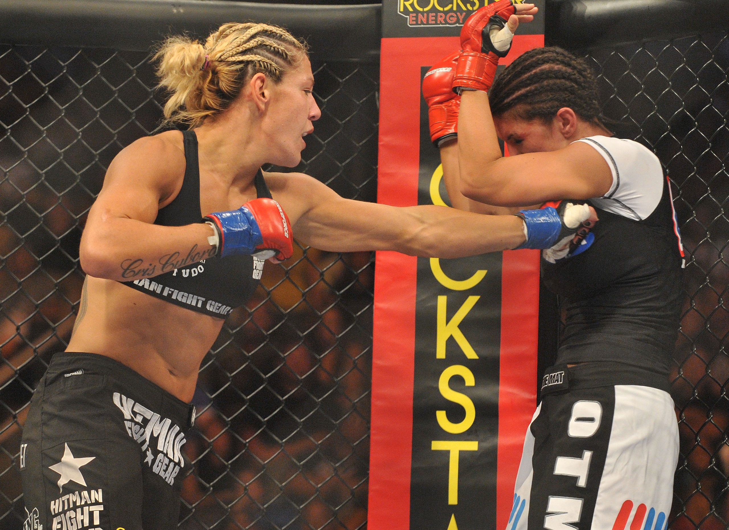 SAN JOSE, CA - AUGUST 15: Cris Cyborg (L) battles Gina Carano during their Middleweight Championship fight at Stikeforce: Carano vs. Cyborg on August 15, 2009 in San Jose, California. (Photo by Jon Kopaloff/Getty Images) SAN JOSE, CA - AUGUST 15: Cris Cyborg (L) battles Gina Carano during their Middleweight Championship fight at Stikeforce: Carano vs. Cyborg on August 15, 2009 in San Jose, California. (Photo by Jon Kopaloff/Getty Images)