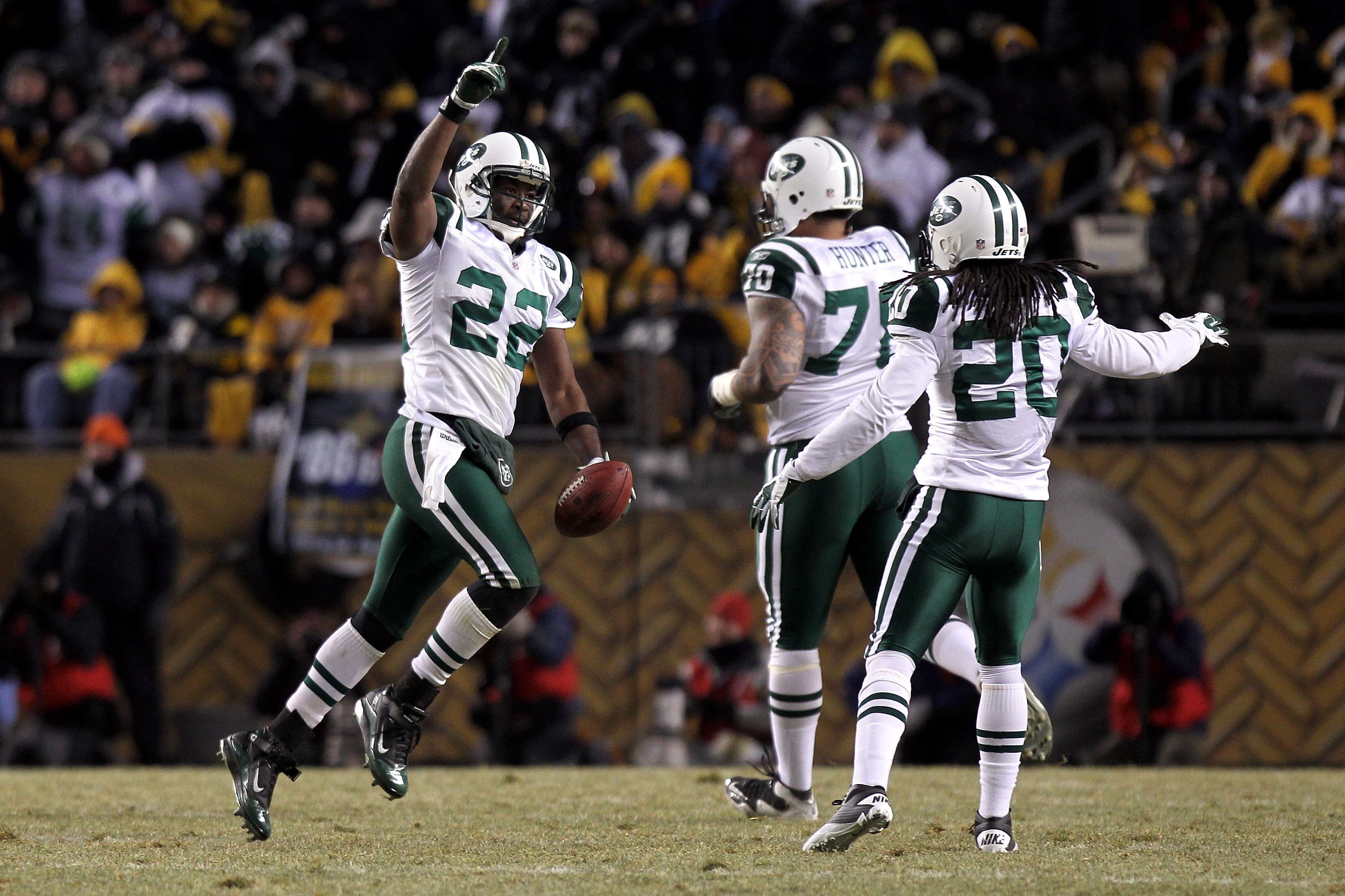 PITTSBURGH, PA - JANUARY 23:  Brodney Pool #22 of the New York Jets celebrates after intercepting a pass intended for Emmanuel Sanders #88 of the Pittsburgh Steelers in the third quarter of the 2011 AFC Championship game at Heinz Field on January 23, 2011