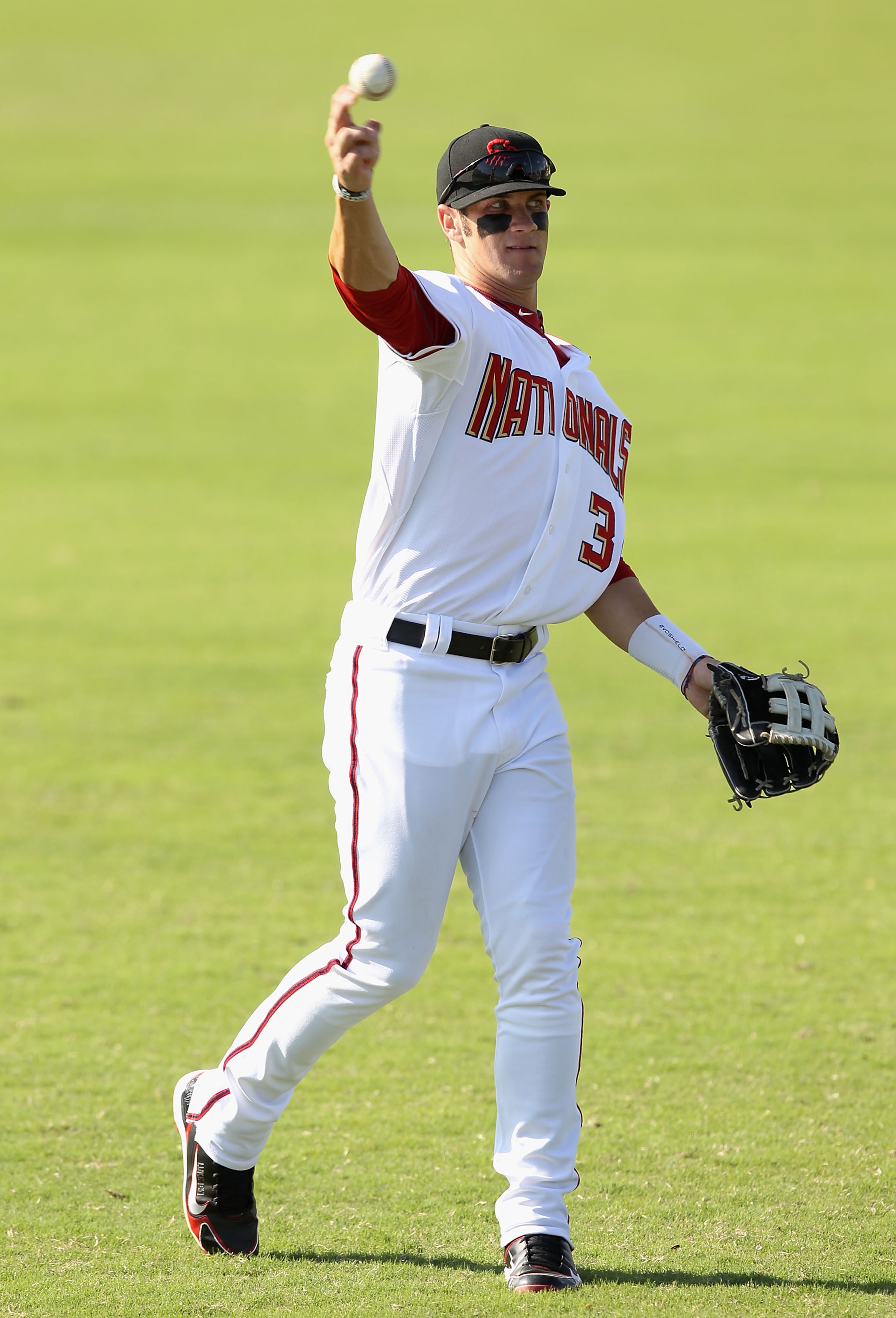 SCOTTSDALE, AZ - OCTOBER 23: Washington Nationals prospect Bryce Harper #34 playing for the Scottsdale Scorpions warms up in the outfield during the AZ Fall League game against the Phoenix Desert Dogs at Scottsdale Stadium on October 23, 2010 in Scottsda SCOTTSDALE, AZ - OCTOBER 23: Washington Nationals prospect Bryce Harper #34 playing for the Scottsdale Scorpions warms up in the outfield during the AZ Fall League game against the Phoenix Desert Dogs at Scottsdale Stadium on October 23, 2010 in Scottsda