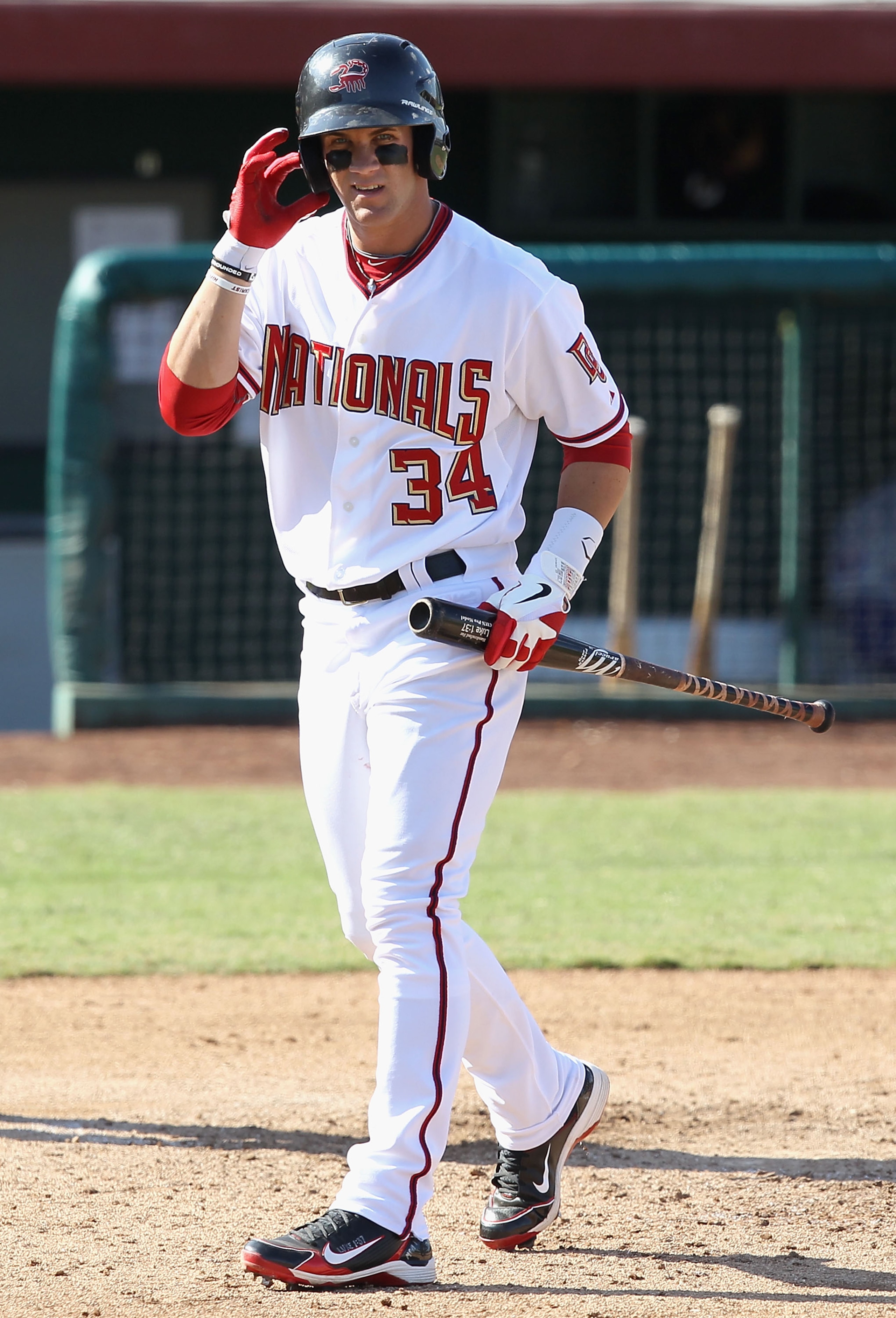 SCOTTSDALE, AZ - OCTOBER 23: Washington Nationals prospect Bryce Harper #34 playing for the Scottsdale Scorpions walks back to the dugout after striking out during the AZ Fall League game against the Phoenix Desert Dogs at Scottsdale Stadium on October 2 SCOTTSDALE, AZ - OCTOBER 23: Washington Nationals prospect Bryce Harper #34 playing for the Scottsdale Scorpions walks back to the dugout after striking out during the AZ Fall League game against the Phoenix Desert Dogs at Scottsdale Stadium on October 2