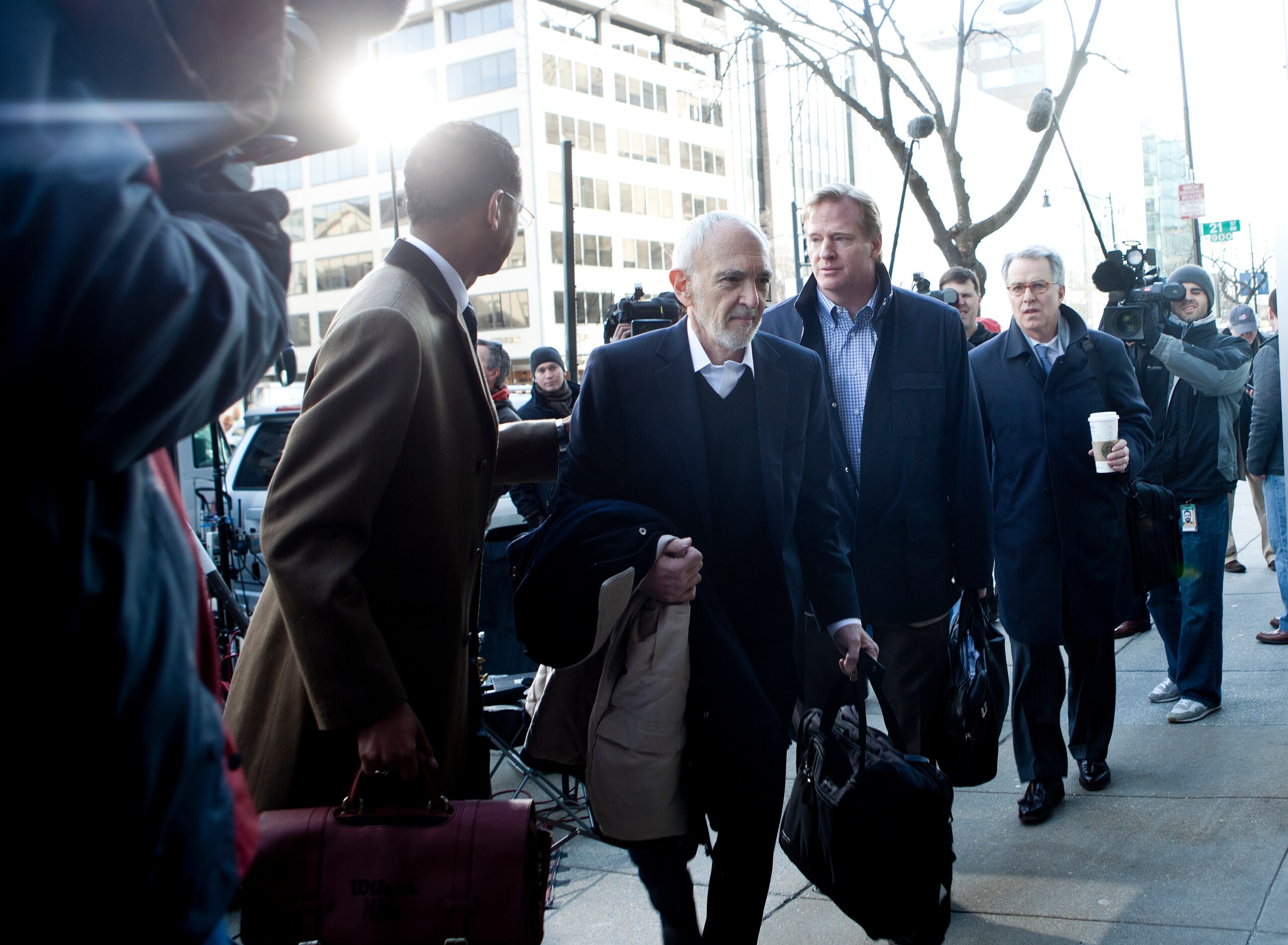 WASHINGTON - MARCH 4: NFL Commissioner Roger Goodell (2R) and others arrives for an extra day of negotiations at the Federal Mediation and Conciliation Service building March 4, 2011 in Washington, DC.  Representatives from the National Football League (N