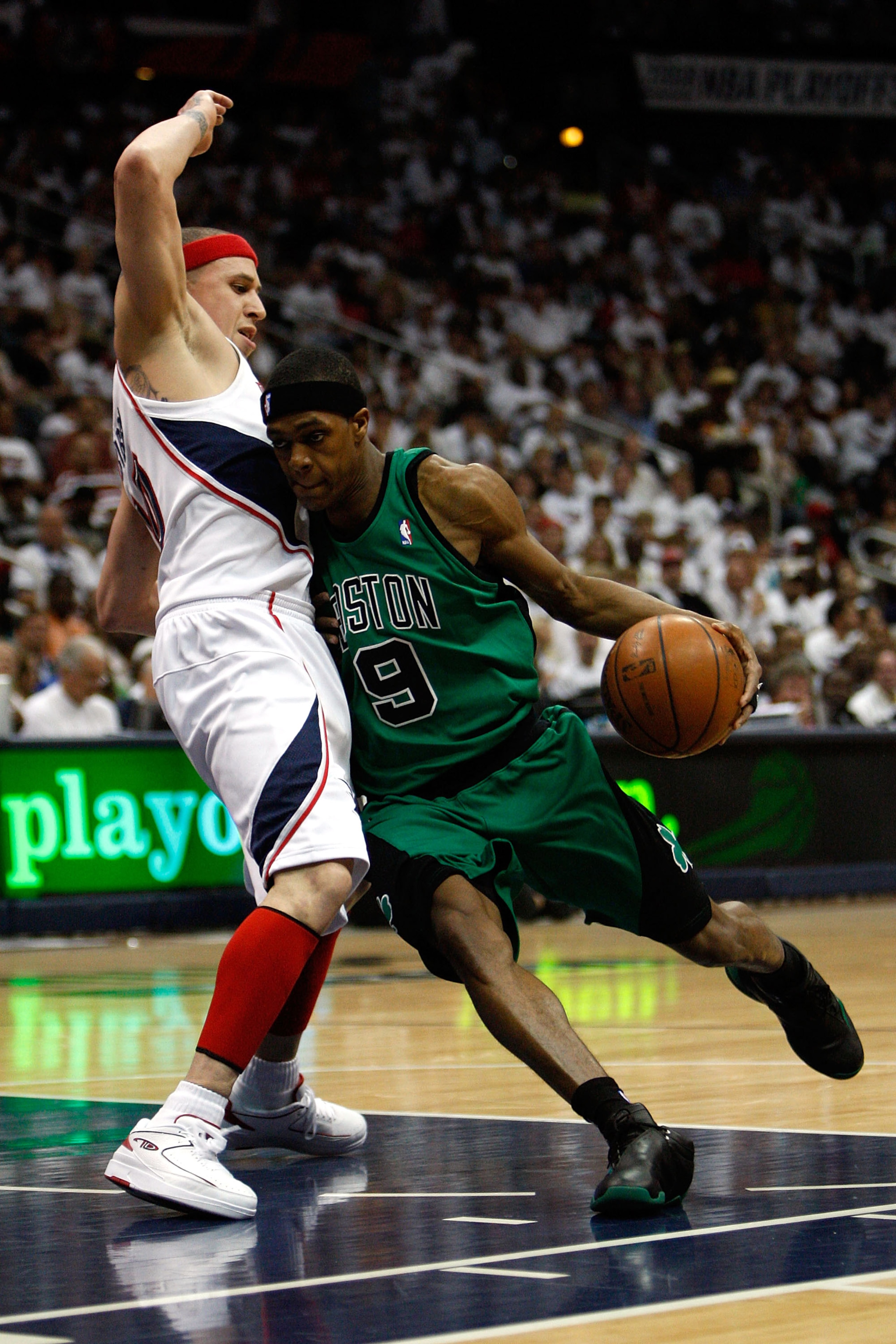 ATLANTA - MAY 02: Rajon Rondo #9 of the Boston Celtics drives the ball around Mike Bibby #10 of the Atlanta Hawks in Game Six of the Eastern Conference Quarterfinals during the 2008 NBA Playoffs at Phillips Arena on May 2, 2008 in Atlanta Georgia. NOTE ATLANTA - MAY 02: Rajon Rondo #9 of the Boston Celtics drives the ball around Mike Bibby #10 of the Atlanta Hawks in Game Six of the Eastern Conference Quarterfinals during the 2008 NBA Playoffs at Phillips Arena on May 2, 2008 in Atlanta Georgia. NOTE