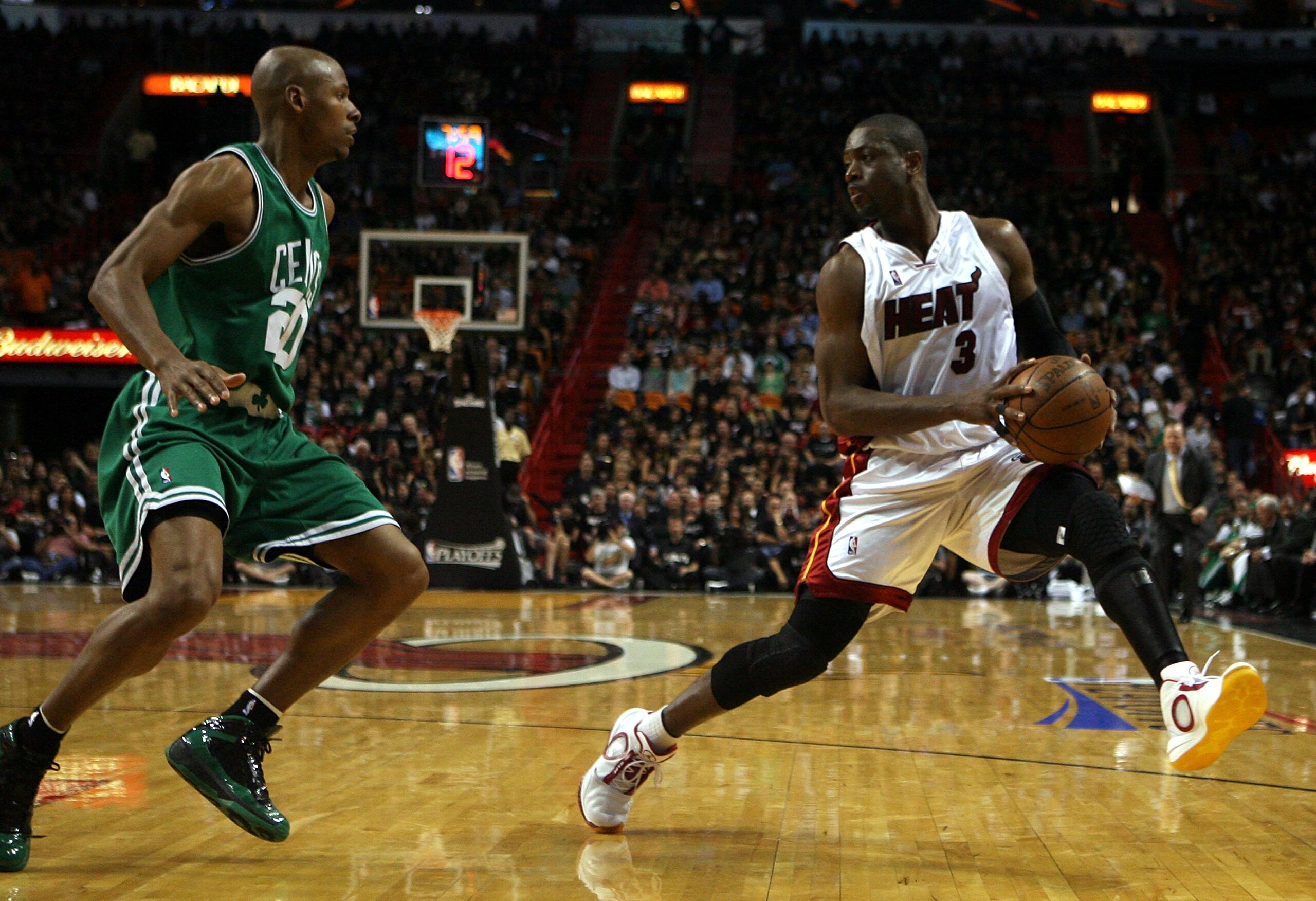 MIAMI - APRIL 23: Guard Ray Allen #20 of the Boston Celtics defends guard Dwyane Wade #3 of the Miami Heat in Game Three of the Eastern Conference Quarterfinals during the 2010 NBA Playoffs at American Airlines Arena on April 23, 2010 in Miami, Florida. MIAMI - APRIL 23: Guard Ray Allen #20 of the Boston Celtics defends guard Dwyane Wade #3 of the Miami Heat in Game Three of the Eastern Conference Quarterfinals during the 2010 NBA Playoffs at American Airlines Arena on April 23, 2010 in Miami, Florida.