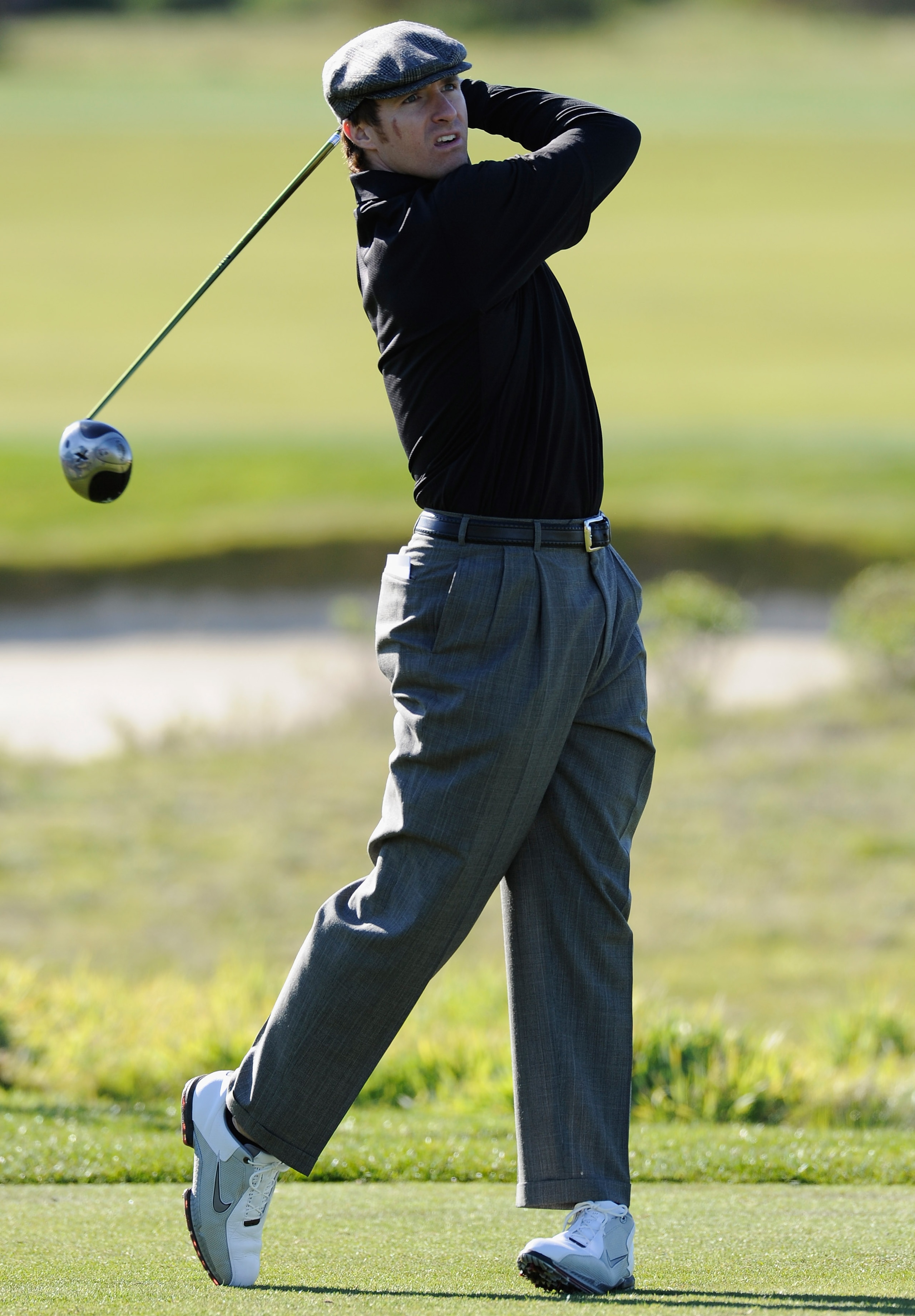 PEBBLE BEACH, CA - FEBRUARY 10: NFL quarterback Drew Brees plays a shot during the first round of the AT&T Pebble Beach National Pro-Am at Monterey Peninsula Country Club on February 10, 2011  in Pebble Beach, California.  (Photo by Stuart Franklin/Getty