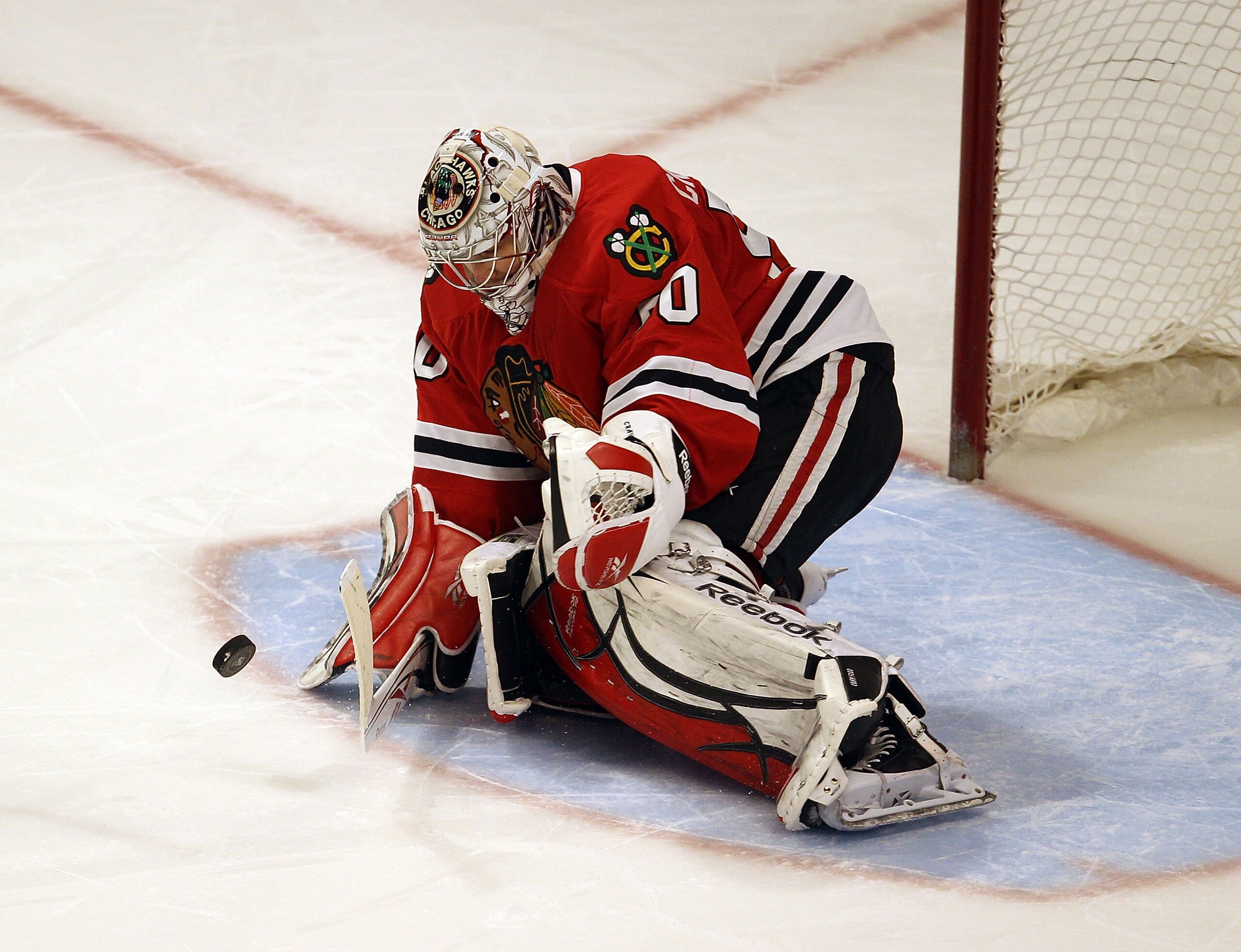 CHICAGO, IL - FEBRUARY 27: Corey Crawford #50 of the Chicago Blackhawks makes a save in the shootout against the Phoenix Coyotes at the United Center on February 27, 2011 in Chicago, Illinois. The Blackhawks defeated the Coyotes 4-3 in a shootout. (Photo CHICAGO, IL - FEBRUARY 27: Corey Crawford #50 of the Chicago Blackhawks makes a save in the shootout against the Phoenix Coyotes at the United Center on February 27, 2011 in Chicago, Illinois. The Blackhawks defeated the Coyotes 4-3 in a shootout. (Photo