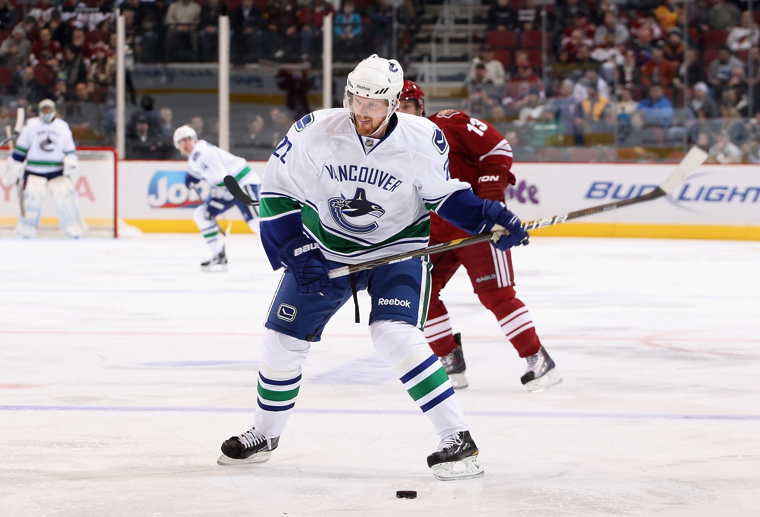 GLENDALE, AZ - FEBRUARY 02: Daniel Sedin #22 of the Vancouver Canucks shoots the puck against the Phoenix Coyotes during the NHL game at Jobing.com Arena on February 2, 2011 in Glendale, Arizona. The Canucks defeated the Coyotes 6-0. (Photo by Christia GLENDALE, AZ - FEBRUARY 02: Daniel Sedin #22 of the Vancouver Canucks shoots the puck against the Phoenix Coyotes during the NHL game at Jobing.com Arena on February 2, 2011 in Glendale, Arizona. The Canucks defeated the Coyotes 6-0. (Photo by Christia