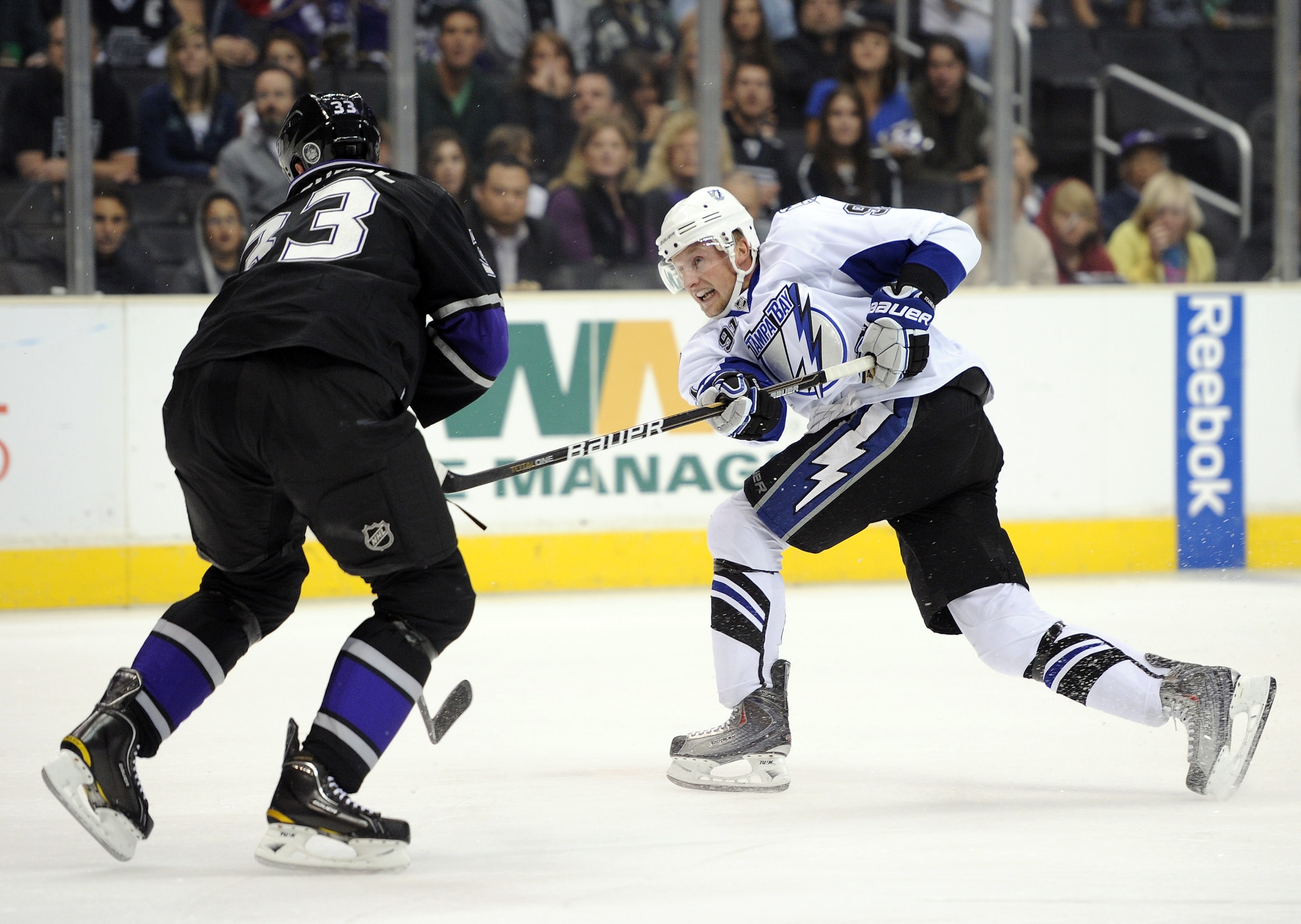 LOS ANGELES, CA - NOVEMBER 04: Steven Stamkos #91 of the Tampa Bay Lightning takes a shot in front of Willie Mitchell #33 of the Los Angeles Kings at Staples Center on November 4, 2010 in Los Angeles, California. (Photo by Harry How/Getty Images) LOS ANGELES, CA - NOVEMBER 04: Steven Stamkos #91 of the Tampa Bay Lightning takes a shot in front of Willie Mitchell #33 of the Los Angeles Kings at Staples Center on November 4, 2010 in Los Angeles, California. (Photo by Harry How/Getty Images)