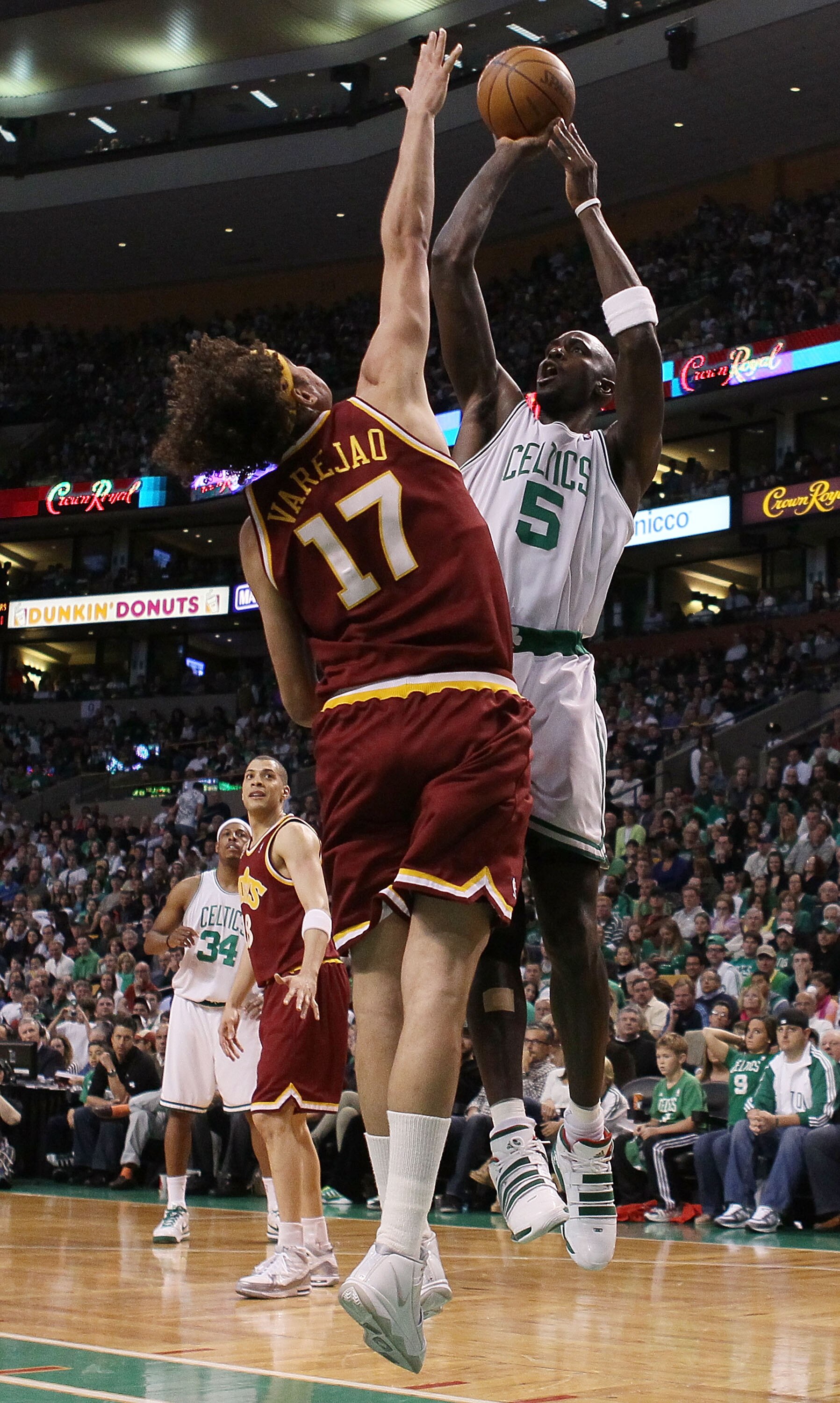 BOSTON - MAY 09: Kevin Garnett #5 of the Boston Celtics takes a shot as Anderson Varejao #17 of the Cleveland Cavaliers defends during Game Four of the Eastern Conference Semifinals of the 2010 NBA playoffs at TD Garden on May 9, 2010 in Boston, Massachu BOSTON - MAY 09: Kevin Garnett #5 of the Boston Celtics takes a shot as Anderson Varejao #17 of the Cleveland Cavaliers defends during Game Four of the Eastern Conference Semifinals of the 2010 NBA playoffs at TD Garden on May 9, 2010 in Boston, Massachu