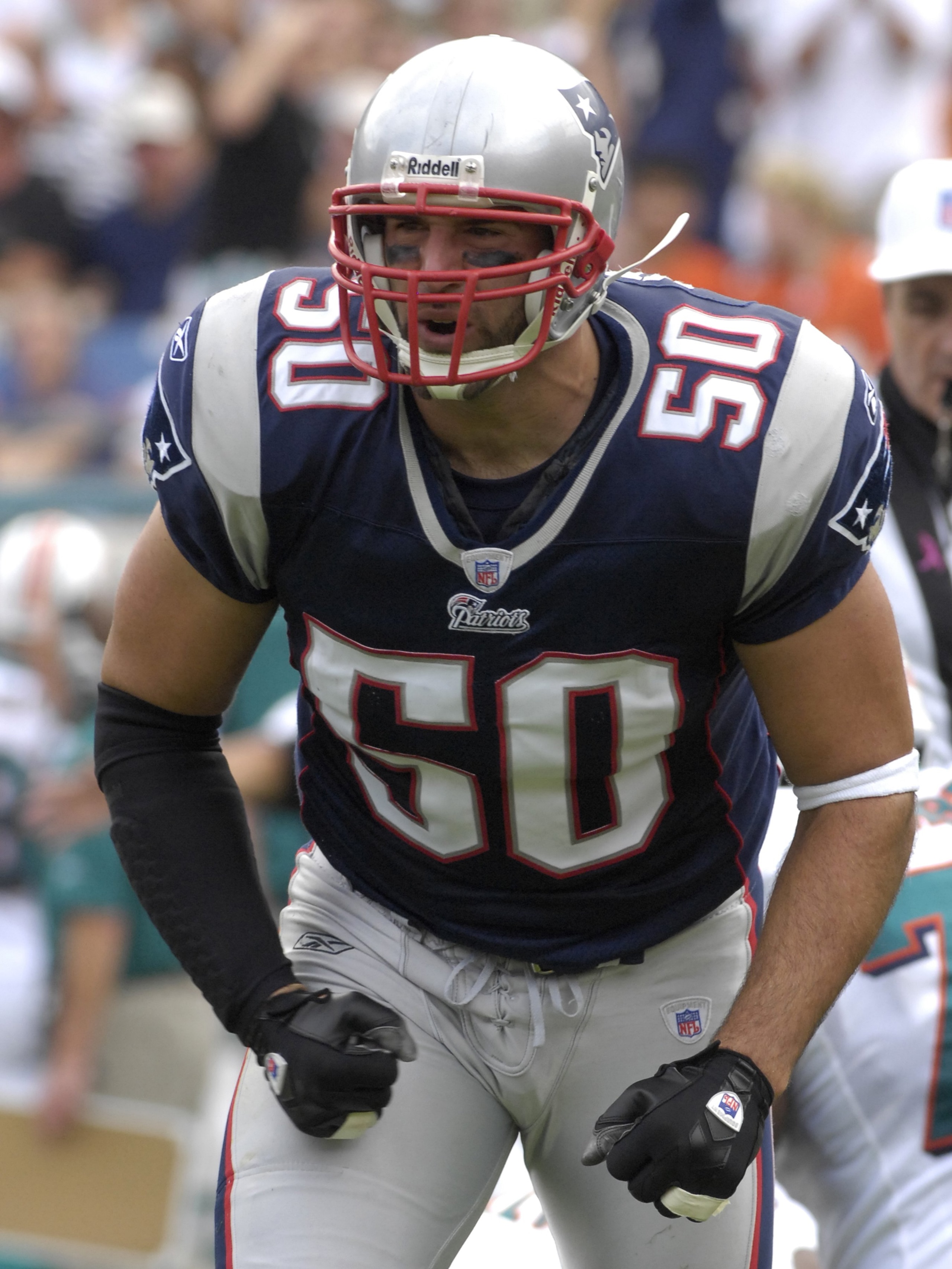 MIAMI, FL - OCTOBER 21: Linebacker Mike Vrabel #50 of the New England Patriots celebrates a fumble recovery against the Miami Dolphins at Dolphin Stadium on October 21, 2007 in Miami, Florida.  The Pats won 49 - 28. (Photo by Al Messerschmidt/Getty Images