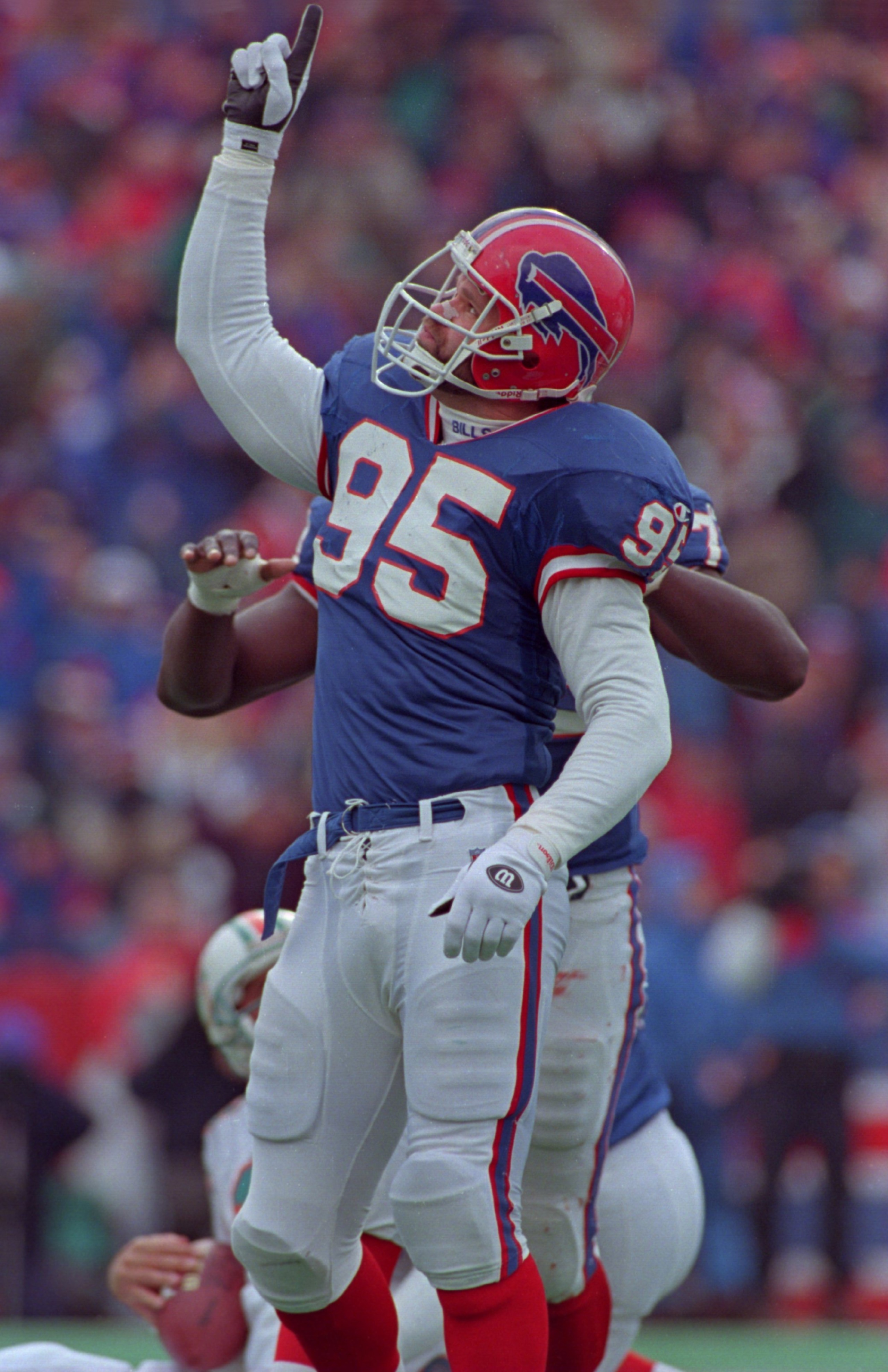 17 DEC 1995:  LINEBACKER BRYCE PAUP OF THE BUFFALO BILLS CELEBRATES DURING THE BILLS 23-20 WIN OVER THE MIAMI DOLPHINS AT RICH STADIUM IN ORCHARD PARK, NEW YORK. Mandatory Credit: Al Bello/ALLSPORT