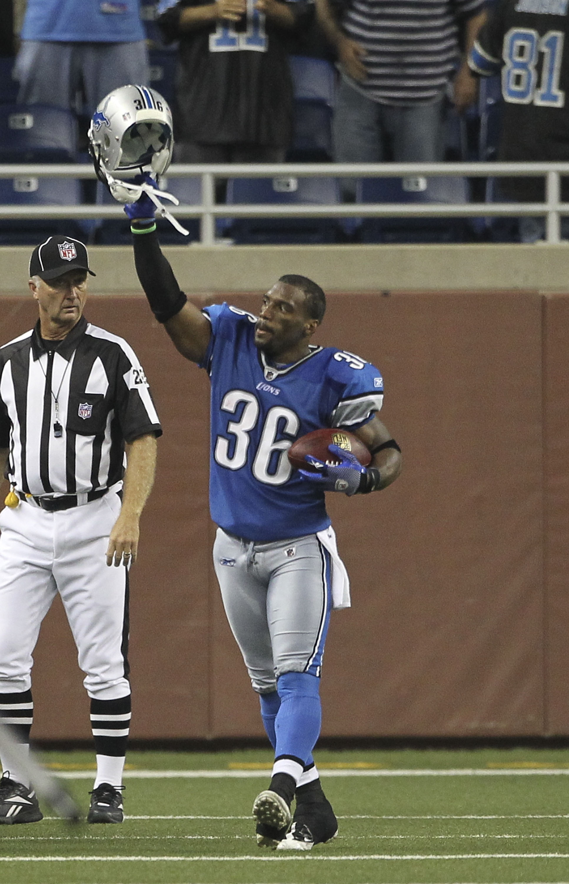 DETROIT - SEPTEMBER 02:  Paul Pratt #36 of the Detroit Lions celebrates after intercepting a pass from Levi Brown #10 of the Buffalo Bills and returned it 102 yards for a fourth quarter touchdown during the preseason game at Ford Field on September 2, 201