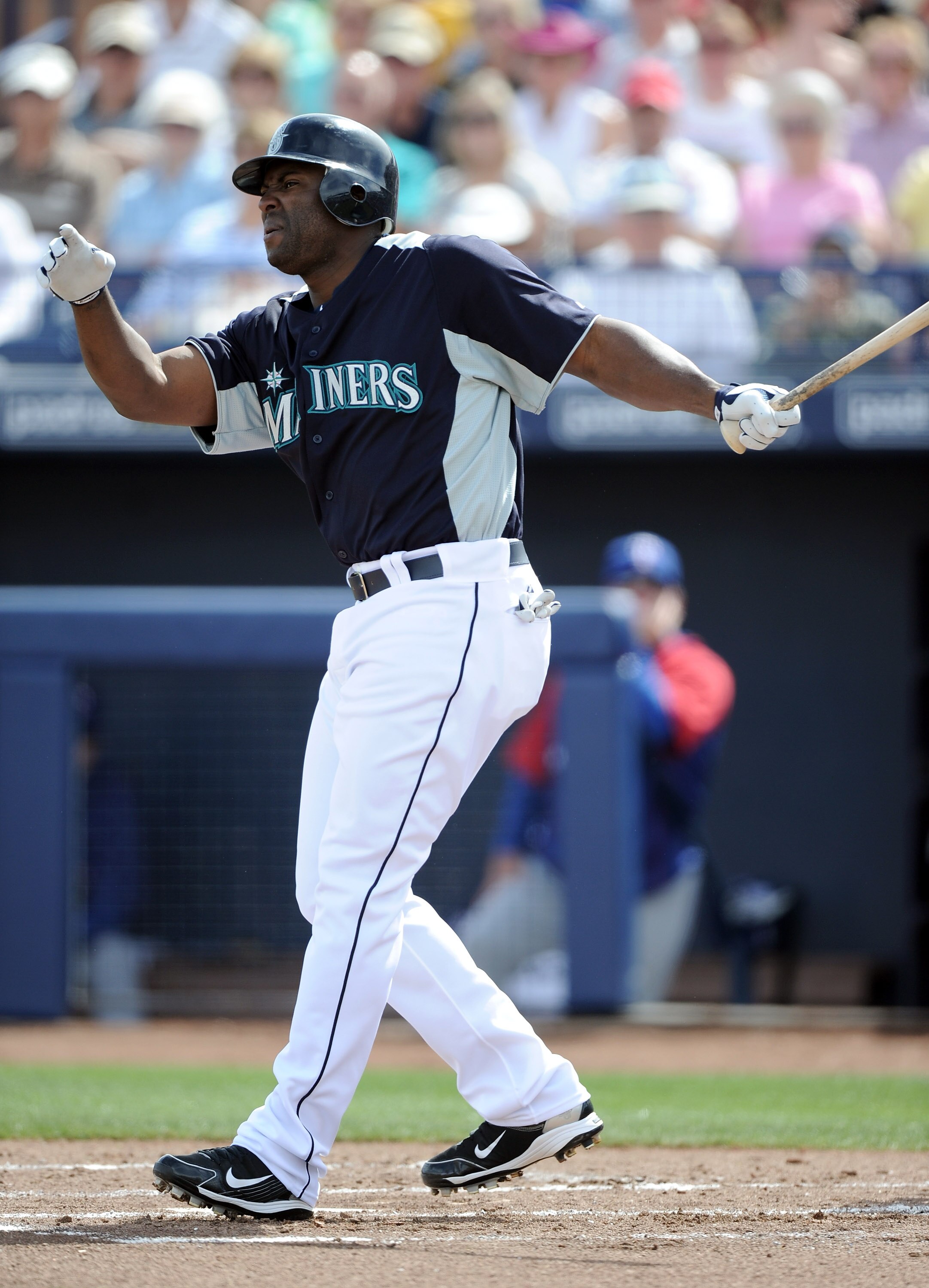 PEORIA, AZ - MARCH 01:  Milton Bradley #15 of the  Seattle Mariners at bat against the Texas Rangers during spring training at Peoria Stadium on March 1, 2011 in Peoria, Arizona.  (Photo by Harry How/Getty Images)