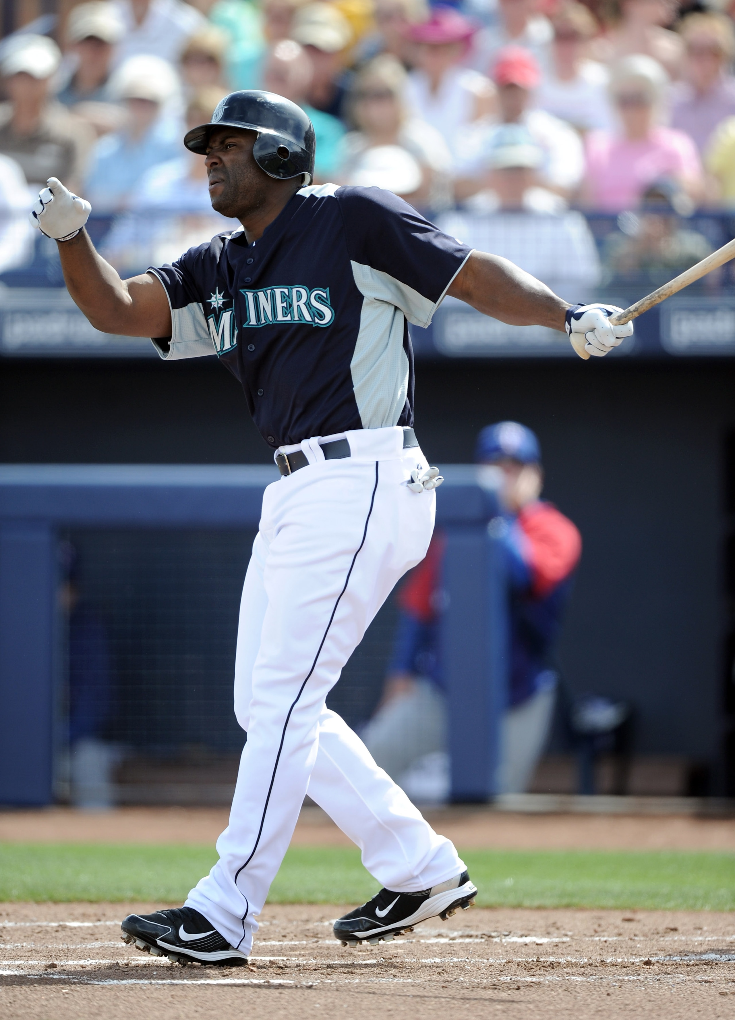PEORIA, AZ - MARCH 01:  Milton Bradley #15 of the  Seattle Mariners at bat against the Texas Rangers during spring training at Peoria Stadium on March 1, 2011 in Peoria, Arizona.  (Photo by Harry How/Getty Images)