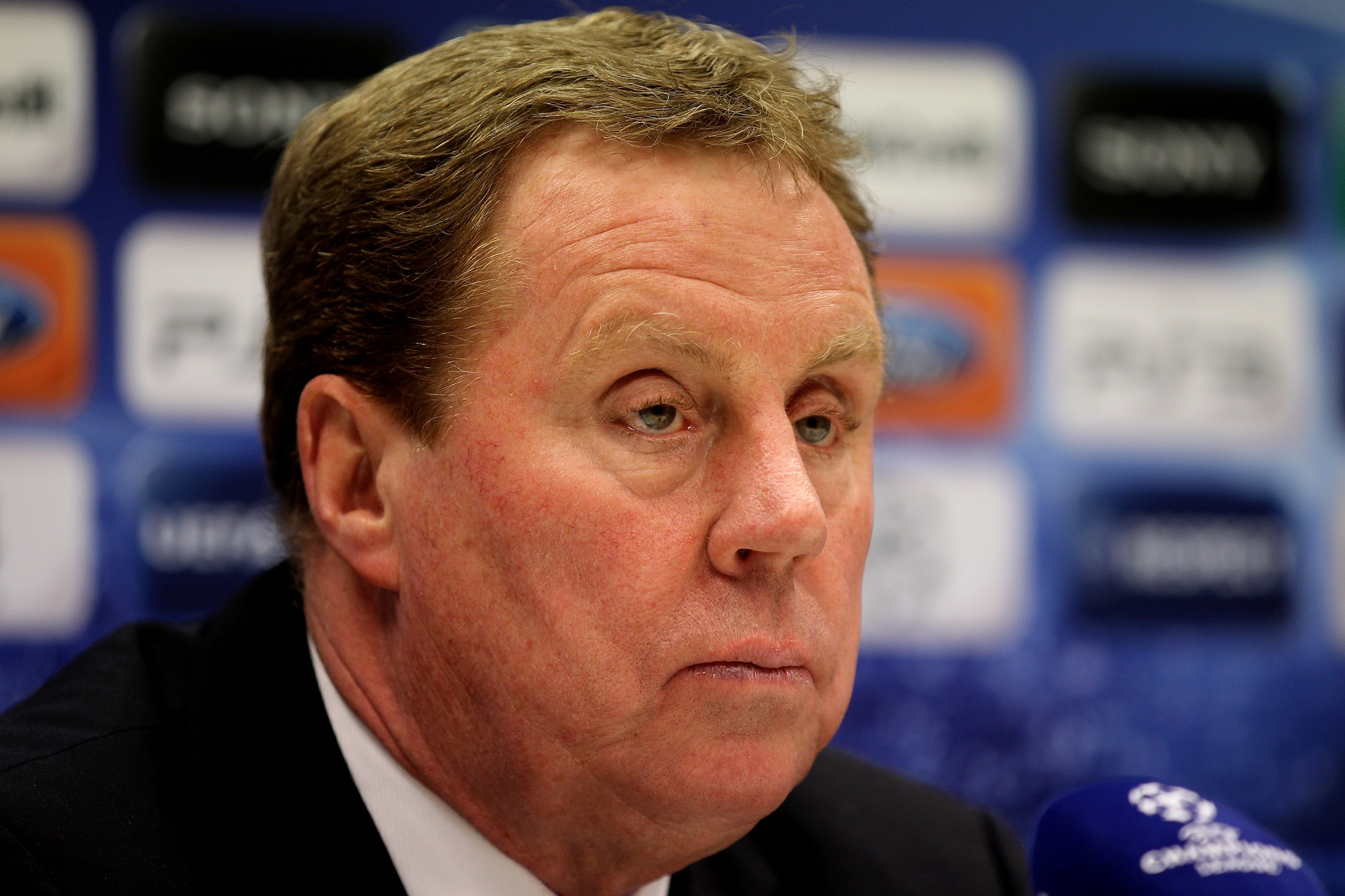 MILAN, ITALY - FEBRUARY 14:  Tottenham Hotspur Manager Harry Redknapp listens to questions during a press conference on the day before the UEFA Champions League Round of 16, 1st leg match between AC Milan and Tottenham Hotspur at the San Siro Stadium on F
