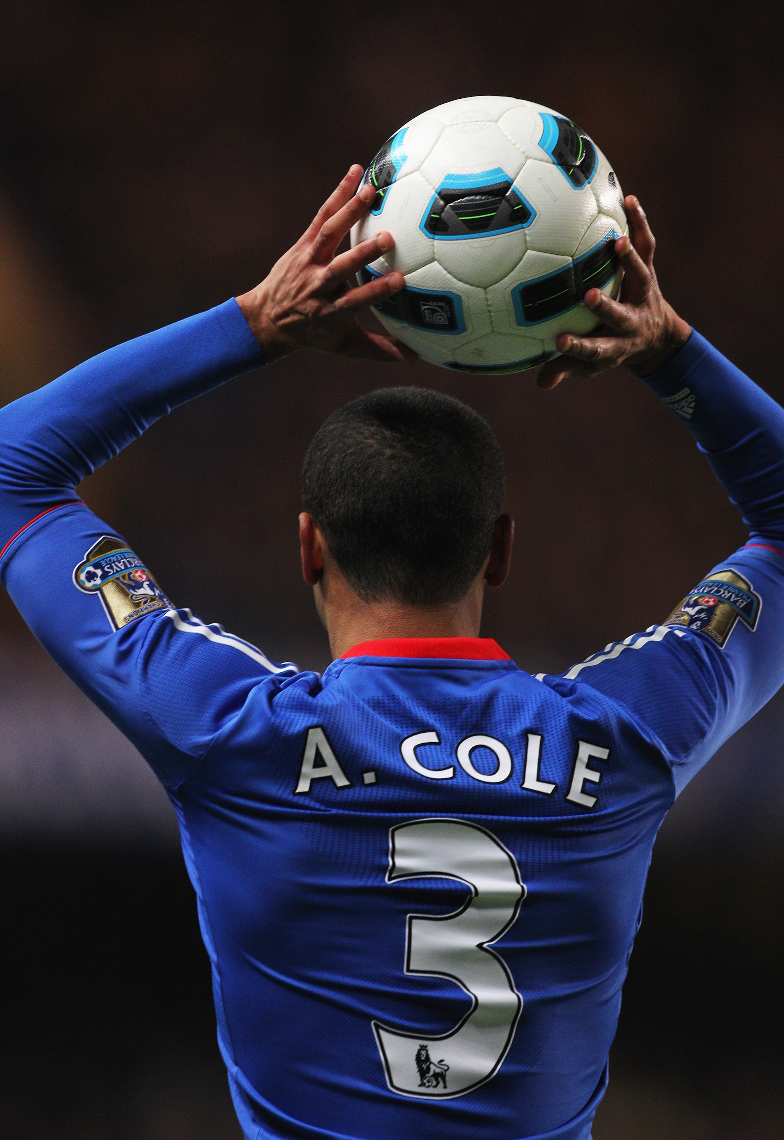 LONDON, ENGLAND - MARCH 01:  Ashley Cole of Chelsea prepares to take a throw in during the Barclays Premier League match between Chelsea and Manchester United at Stamford Bridge on March 1, 2011 in London, England.  (Photo by Clive Rose/Getty Images)
