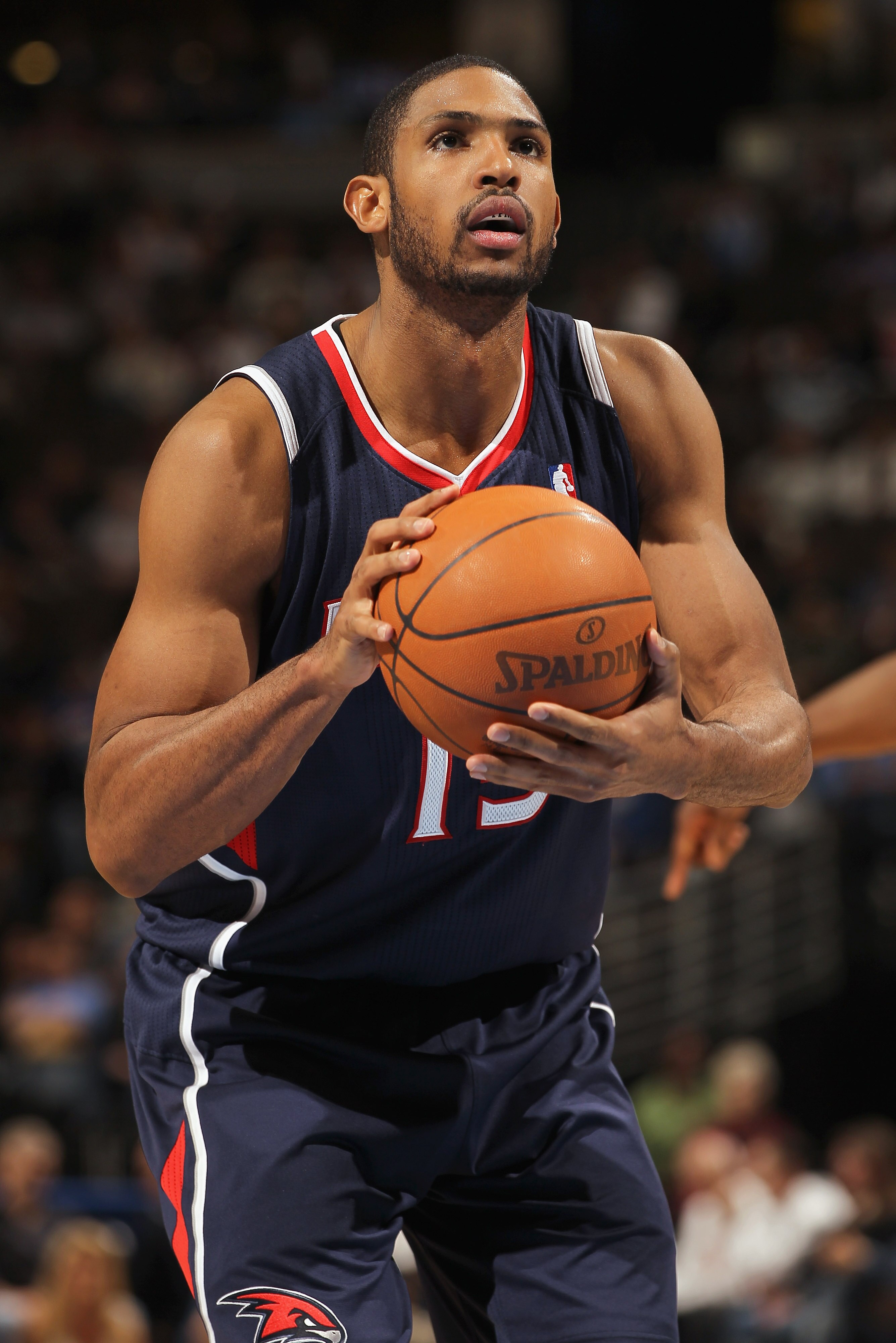 DENVER, CO - FEBRUARY 28:  Al Horford #15 of the Atlanta Hawks takes a free throw against the Denver Nuggets during NBA action at the Pepsi Center on February 28, 2011 in Denver, Colorado. The Nuggets deafeated the Hawks 100-90. NOTE TO USER: User express